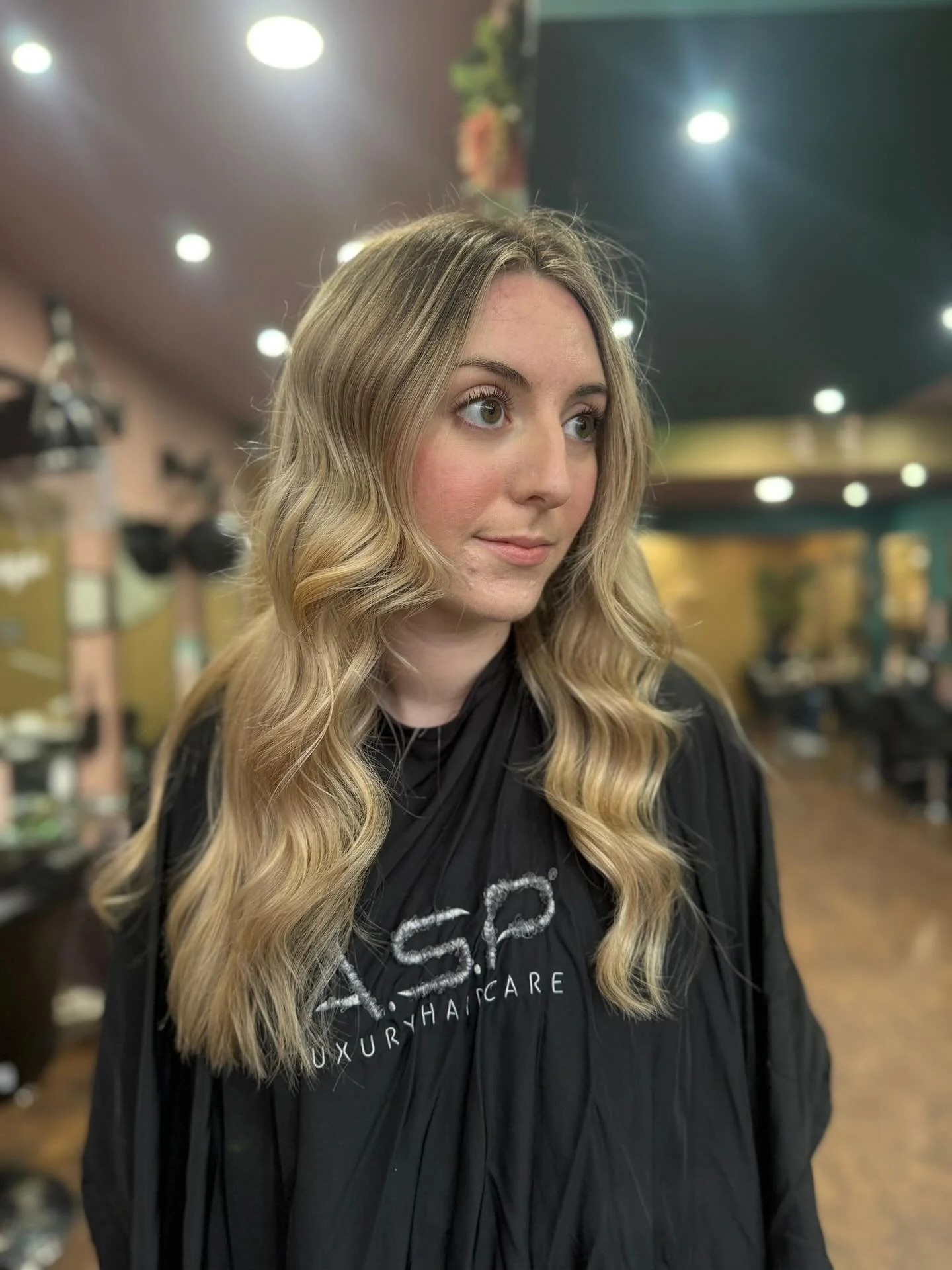 Chloe&rsquo;s client came to us with several months of regrowth, she&rsquo;s been vivid blonde but found the upkeep too much to maintain. So we changed direction and created a lived-in blonde instead. The result is a softer, more natural look that st