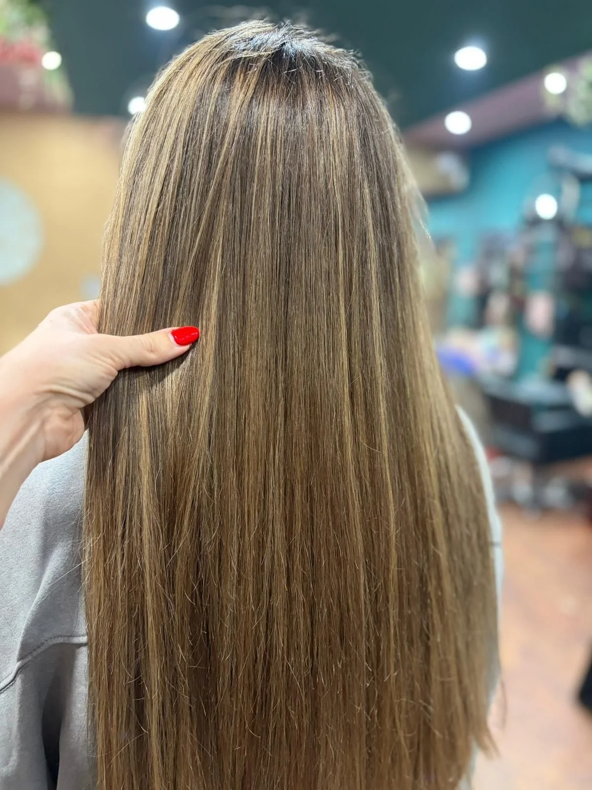 Leigh worked her magic 
This client had outgrown her halo and wanted a softer, more natural look. Leigh broke up the blonde with lowlights, then refreshed the rest with highlights. The result is beautifully blended colour that feels fresh and effortl