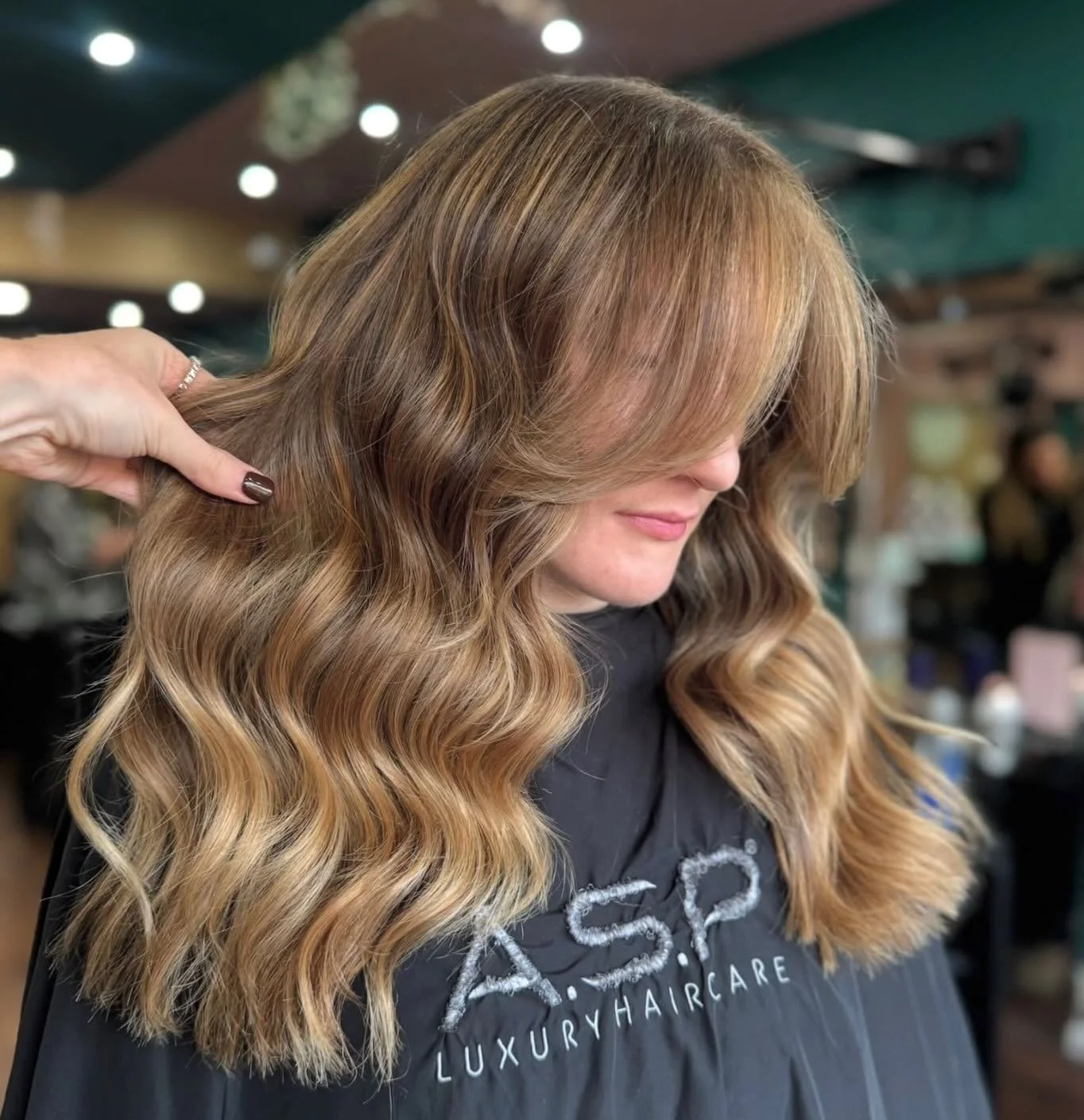 This beautiful blend is all about natural shine, gentle dimension, and a finish that feels effortless but polished.
Created by our lovely stylist Darcie, this look is ideal if you want hair that feels fresh, bright, and easy to wear every day.
If you