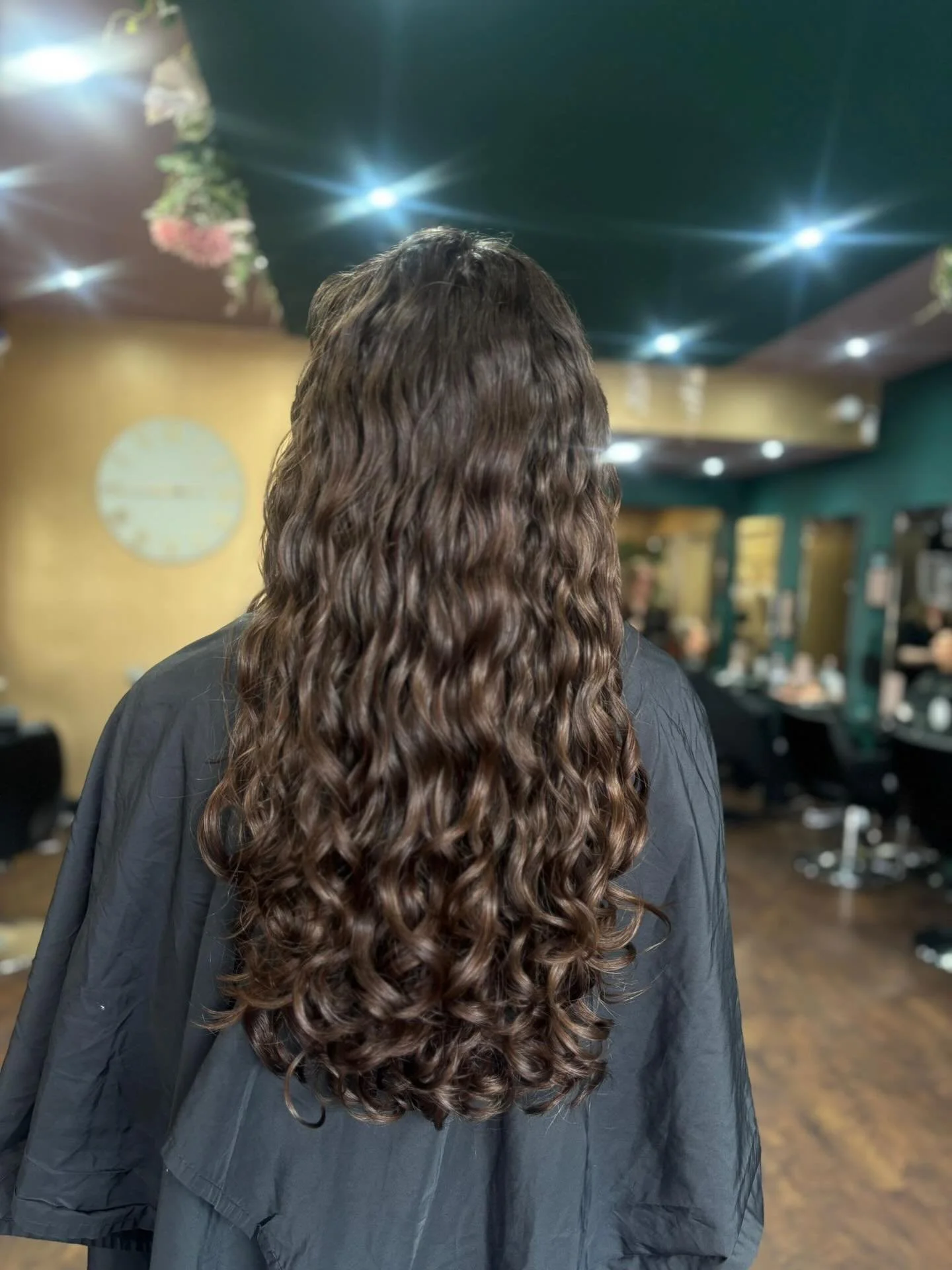 This is what a Curly Cut Experience at Allure looks like.
Before, her curls felt heavy, dry, and undefined. The shape had grown out and the waves were missing that bounce.
After Connie worked her magic, the curls are lighter, more defined, and full o