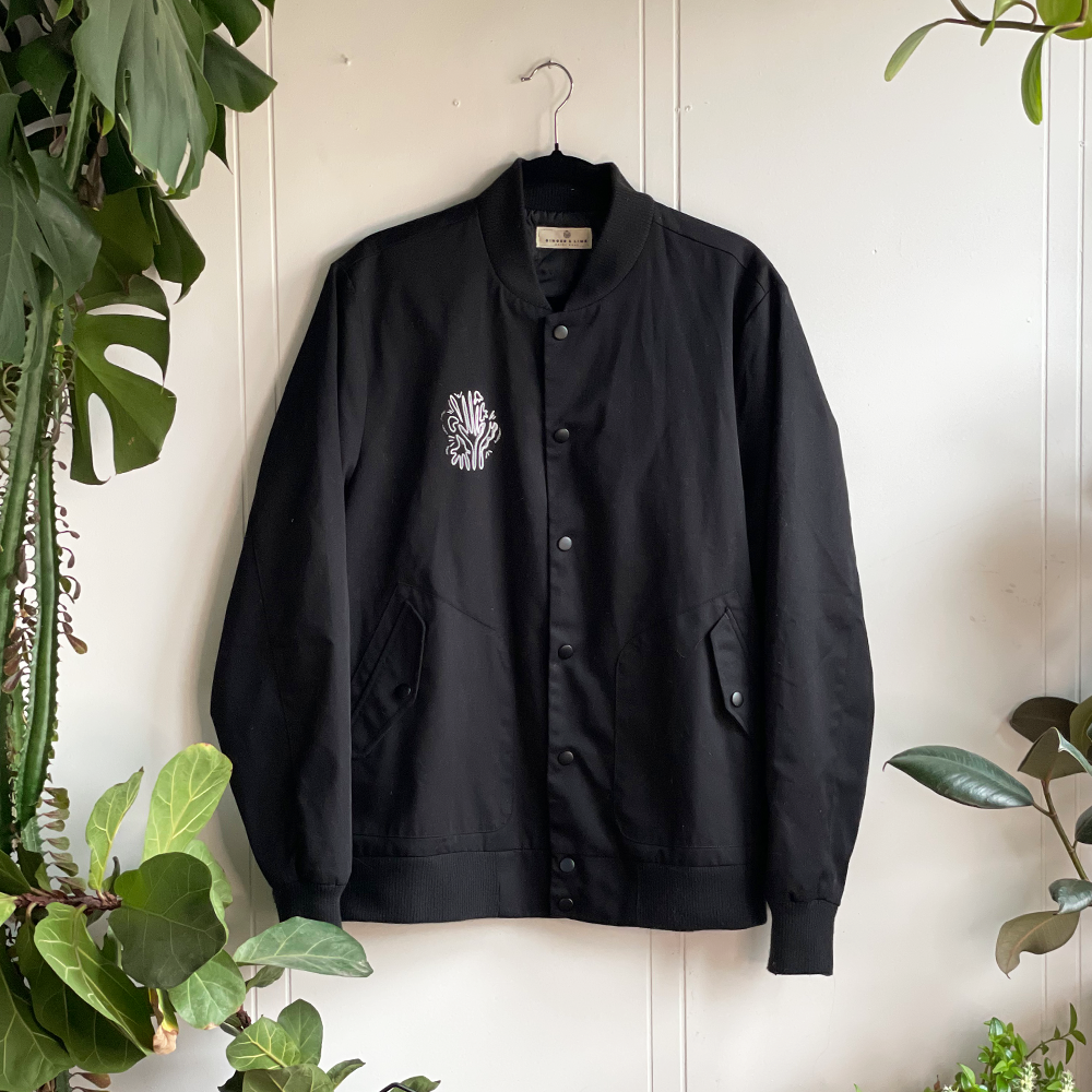 1000x1000px-May25-2col-cor-blk-bomber.png