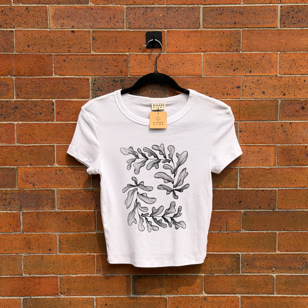 Strange Leaves Baby Tee White