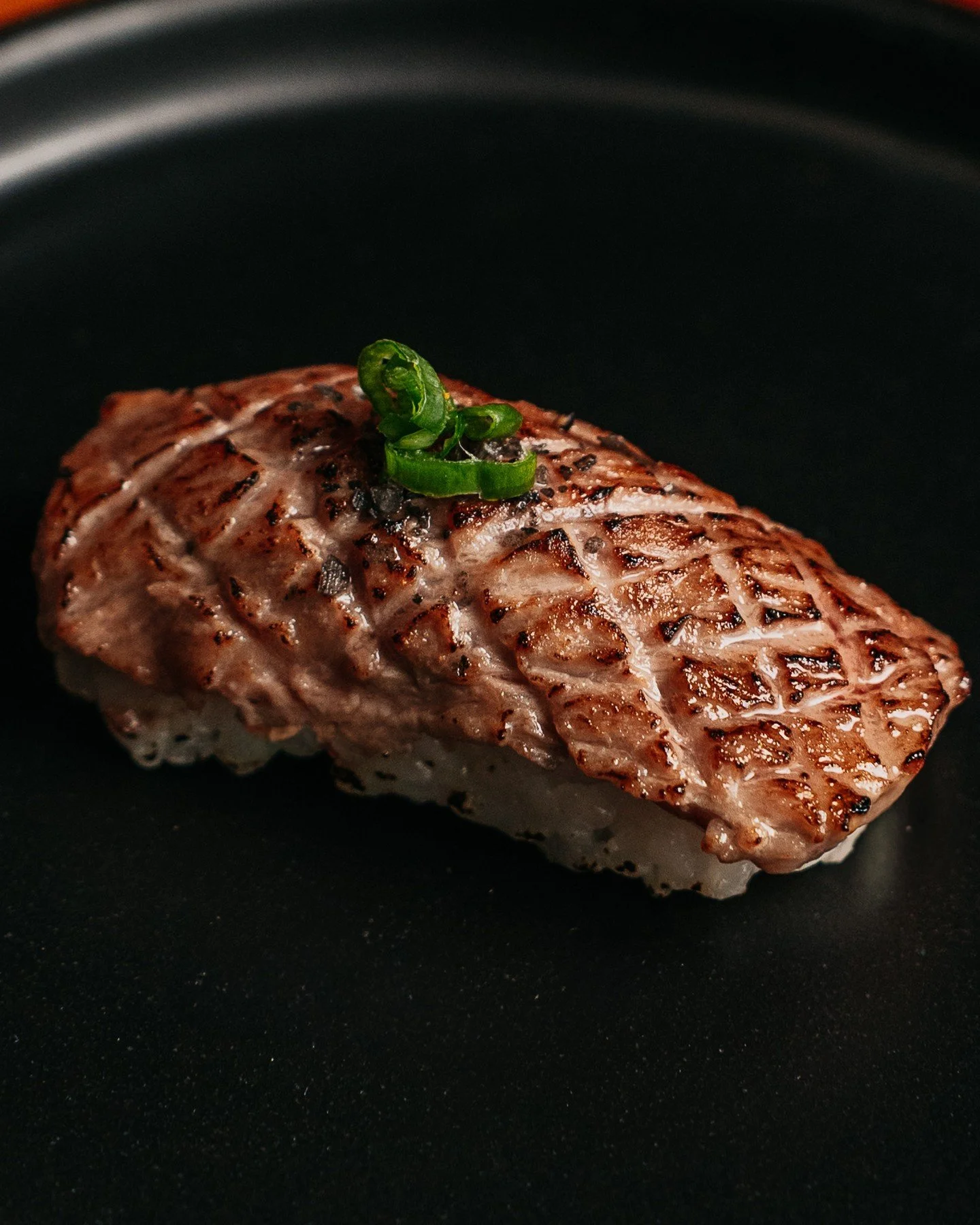 Our wagyu nigiri melts in your mouth 🍣 But don&rsquo;t just take our word for it, join us on Sundays and enjoy 1/2 off all wagyu menu items 💚