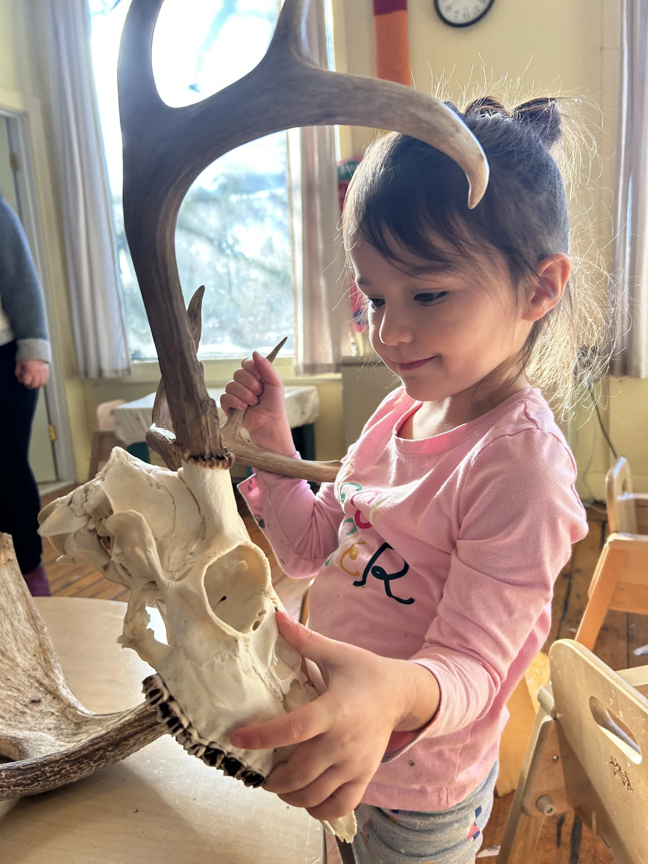 Paige Holding Deer Skull.jpeg