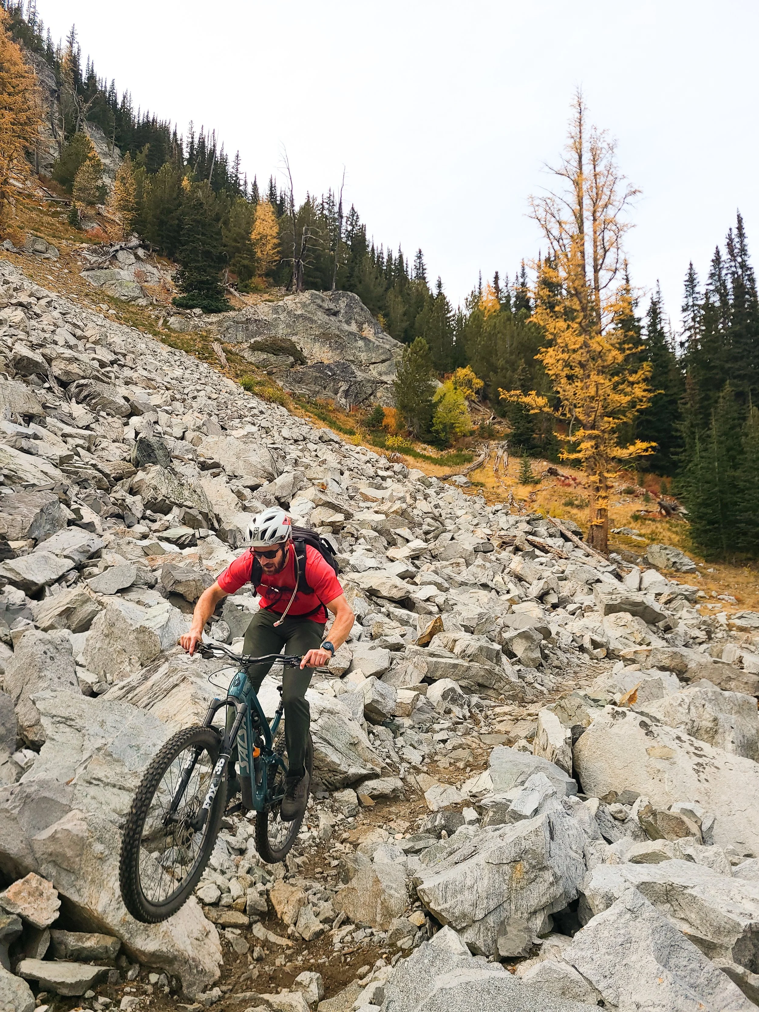 Mountain Biker riding through rocks on Martin Creek Trail