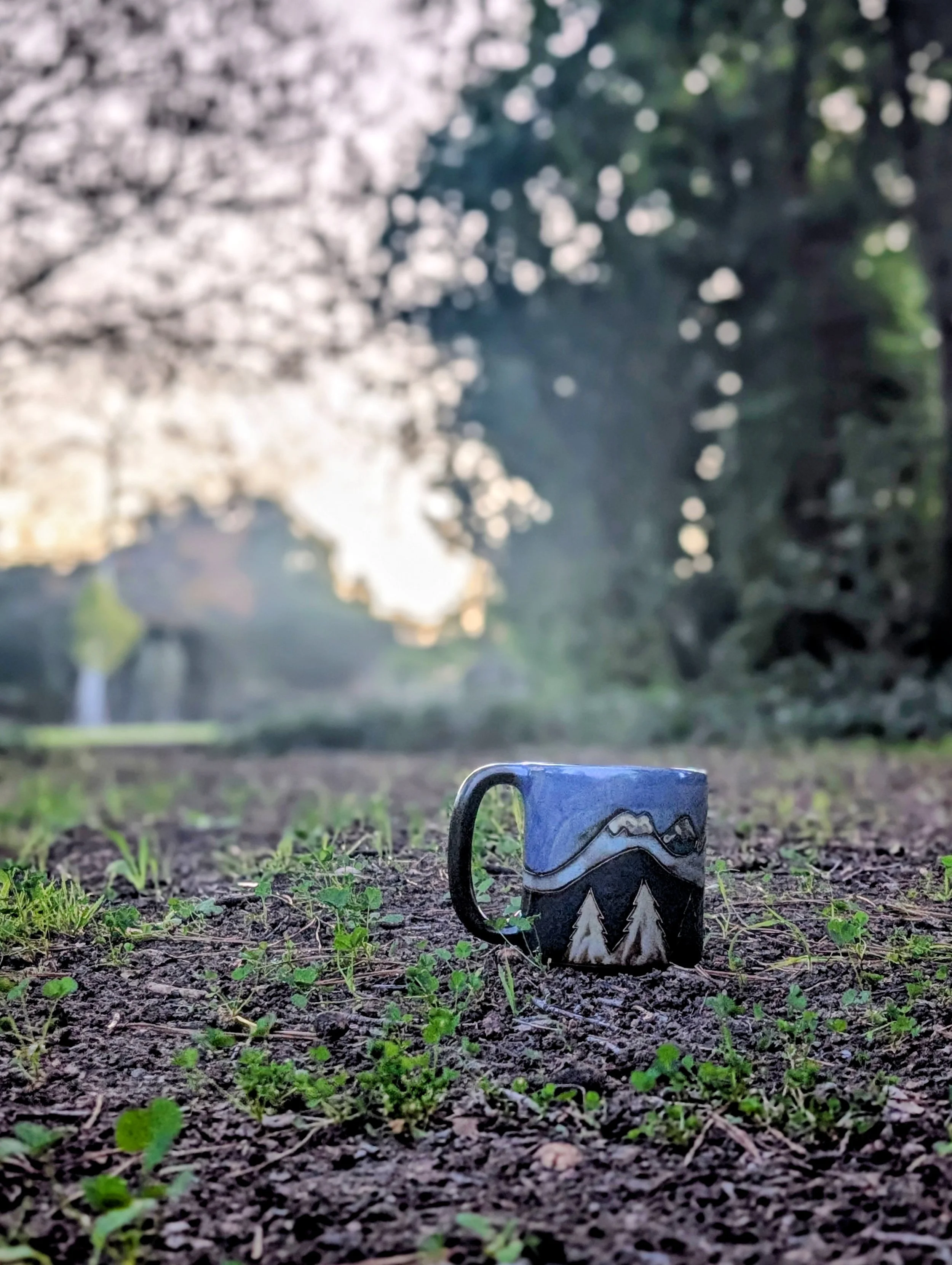 mug in grass
