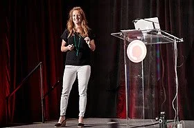 public speaking dark red black white