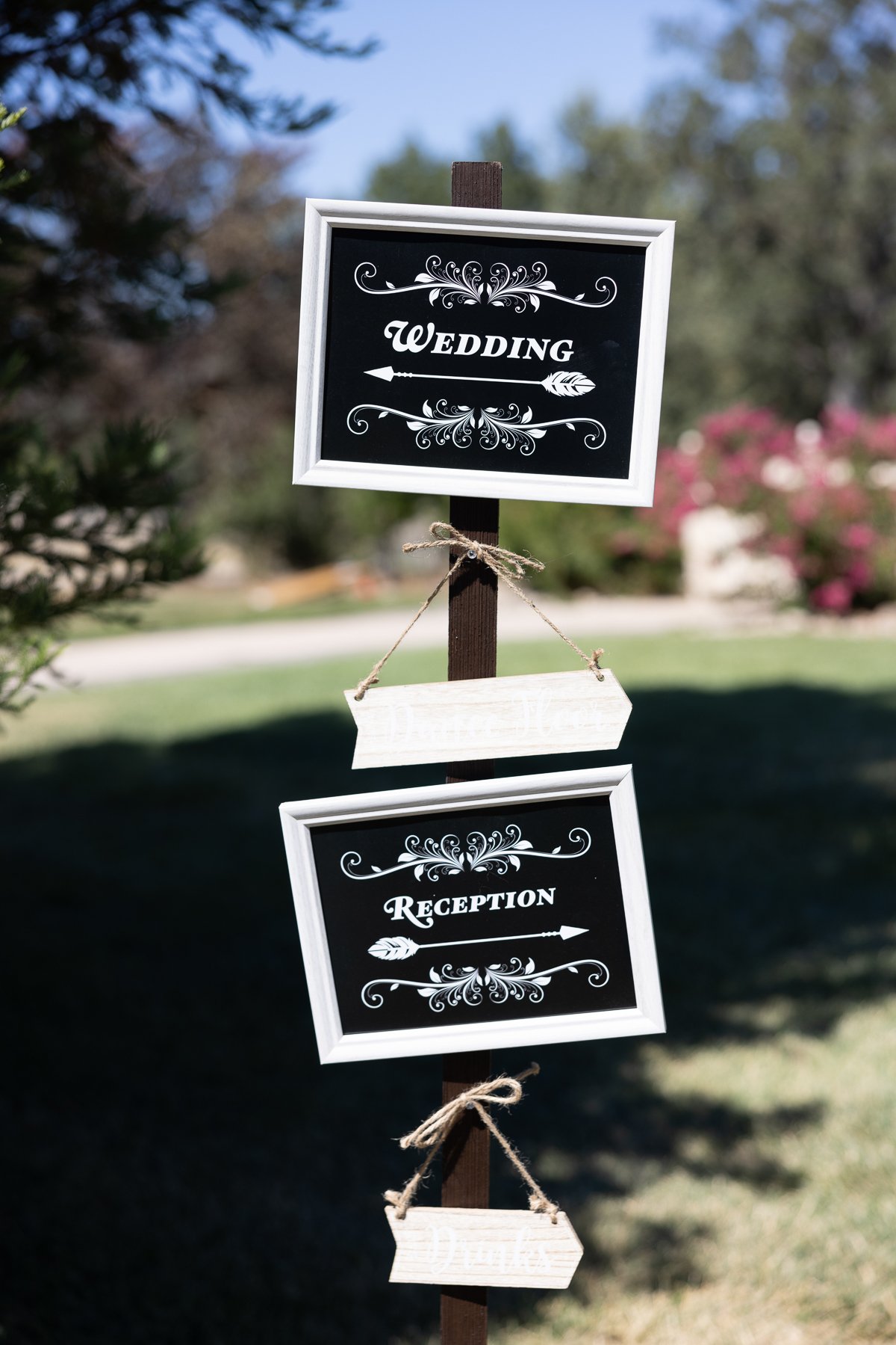    Charming wedding sign with romantic calligraphy, welcoming guests to the celebration, captured in a detail photograph.   