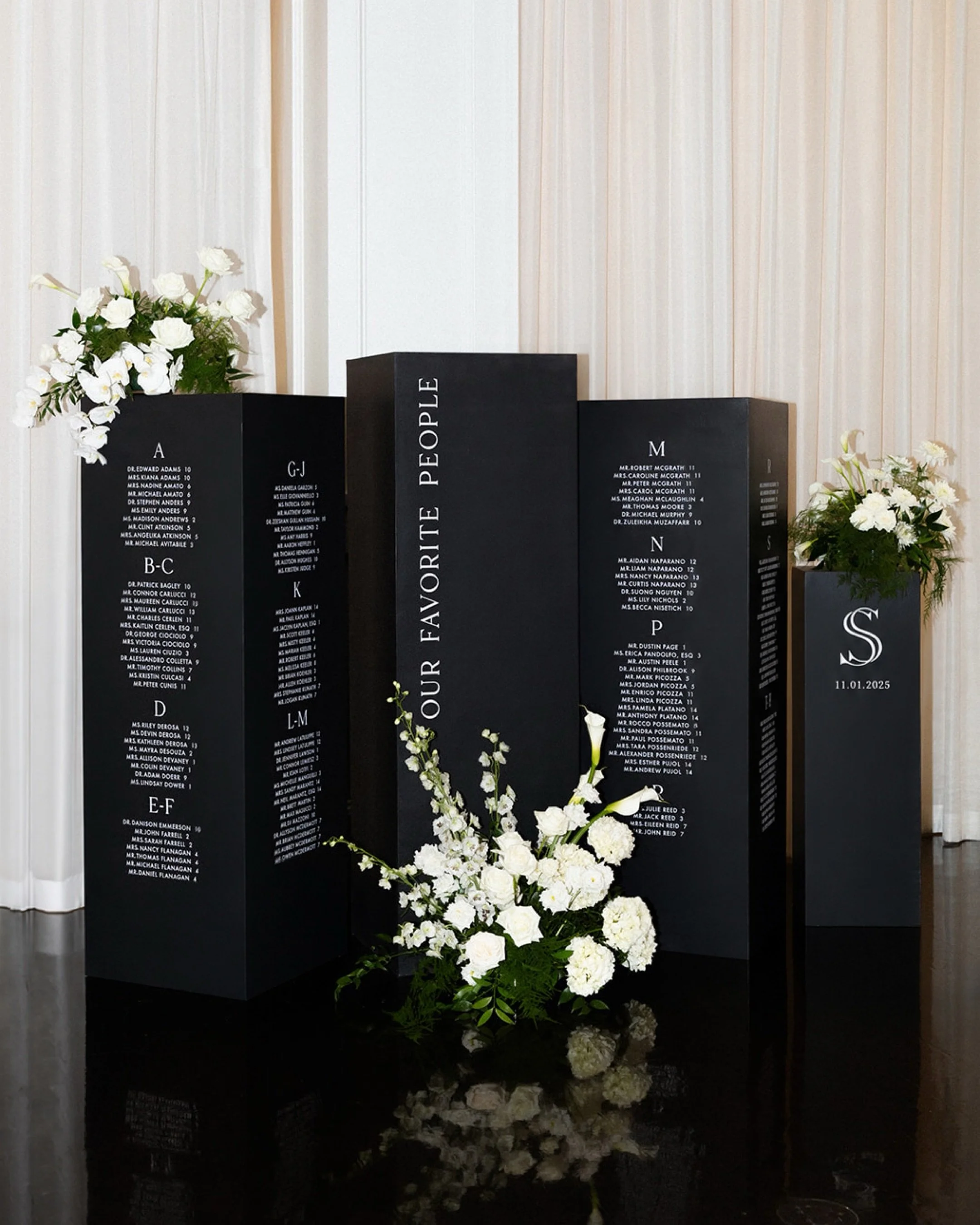 less color, more drama 🖤

Photography | @nicolemadayphoto
Florals | @amusefloralco s
Signage | @walltowallink 
Venue | @lakeviewpavilion 
Dress | @flairboston  @kellyfaetanini 
Tux | @indochinoweddings 
Rings | @barmakian 
Makeup | @tlc.glam 
Band |