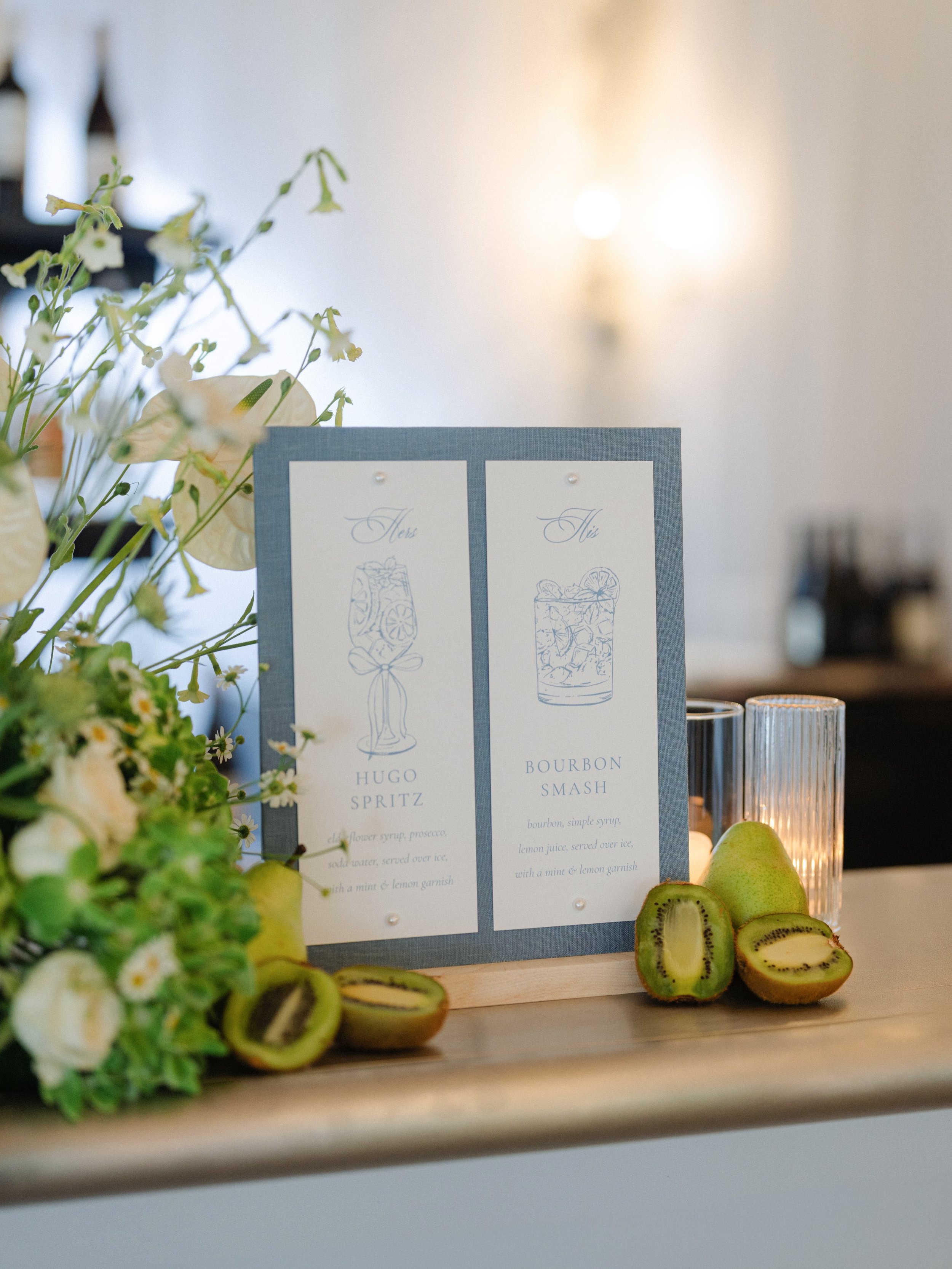 The prettiest love stories are told in the details. 🩵 

Planning &amp; Design | @stephaniekingevents 
Photography | @whitneyandmatsaya 
Signage | @walltowallink 
Venue | @misselwoodevnts 
Couple | @oliviasedler 
Florals | @keriannenelsonflora 
Makeu