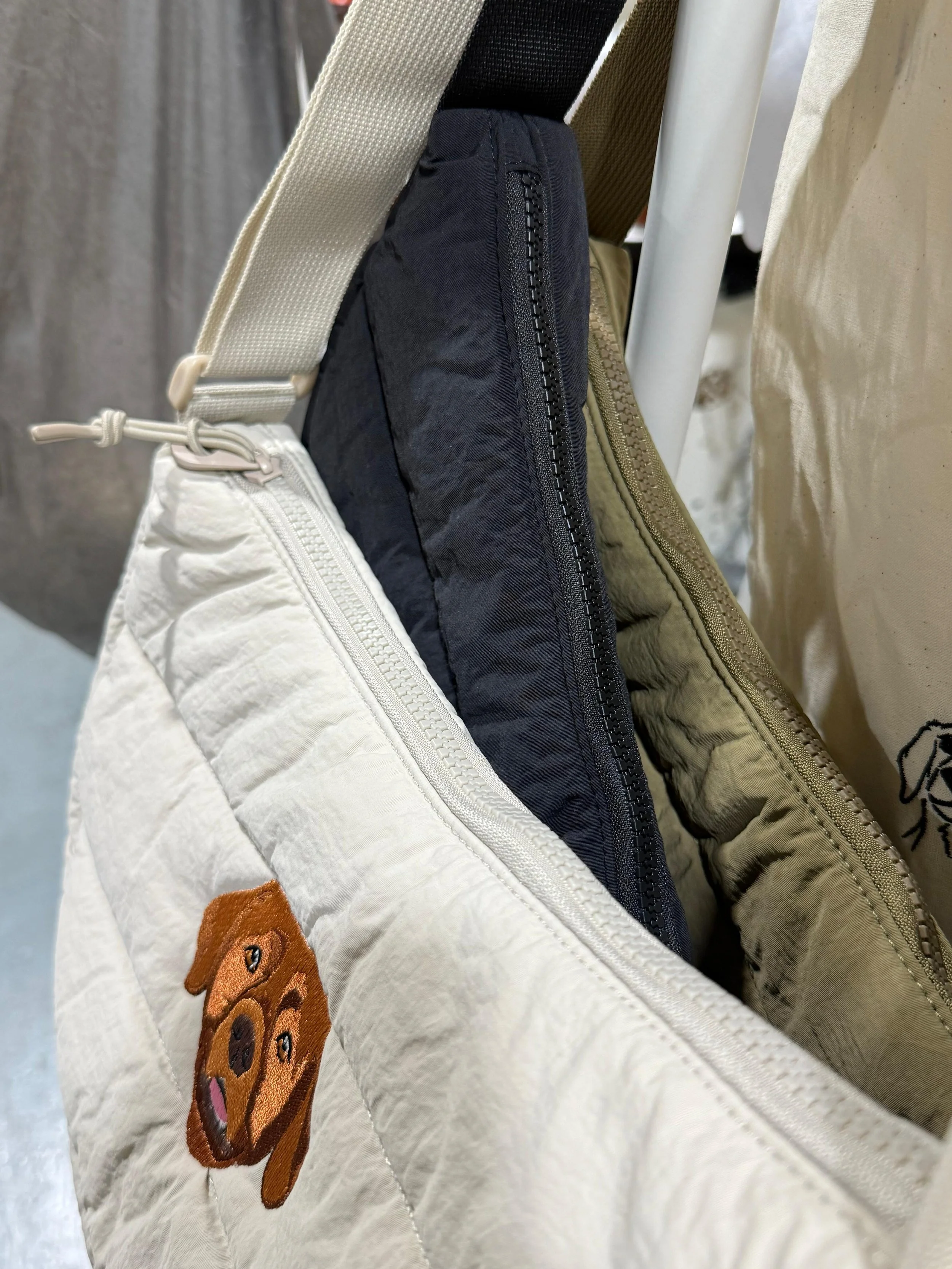 Embroidered Line Drawing Quilted Sling Bag