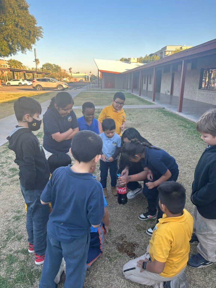 A perfect day for a science experiment! We learned about self-control today with the help of Coke and Mentos!