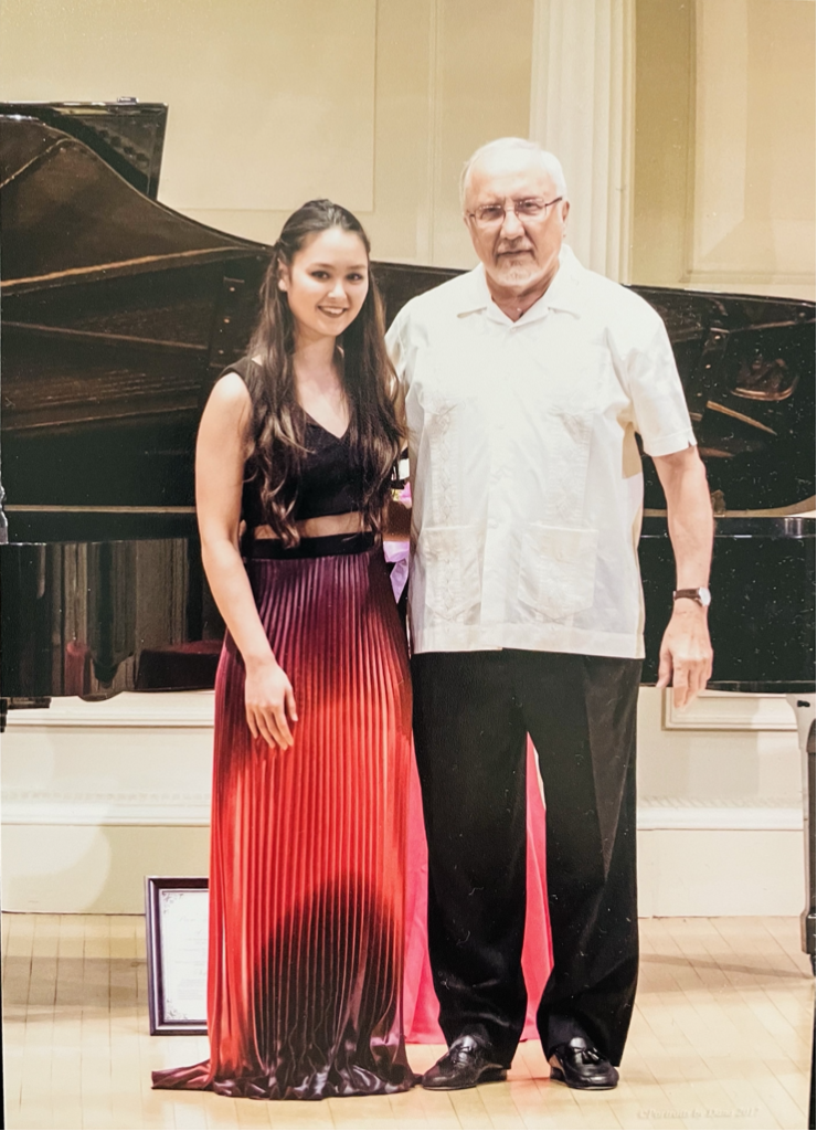 Mr. Ferry, PTSA Director, congratulates Elizabeth Sweetra for receiving 10 years of winning awards - Photo taken by Dana Benner (portraitsbydana@hotmail.com).