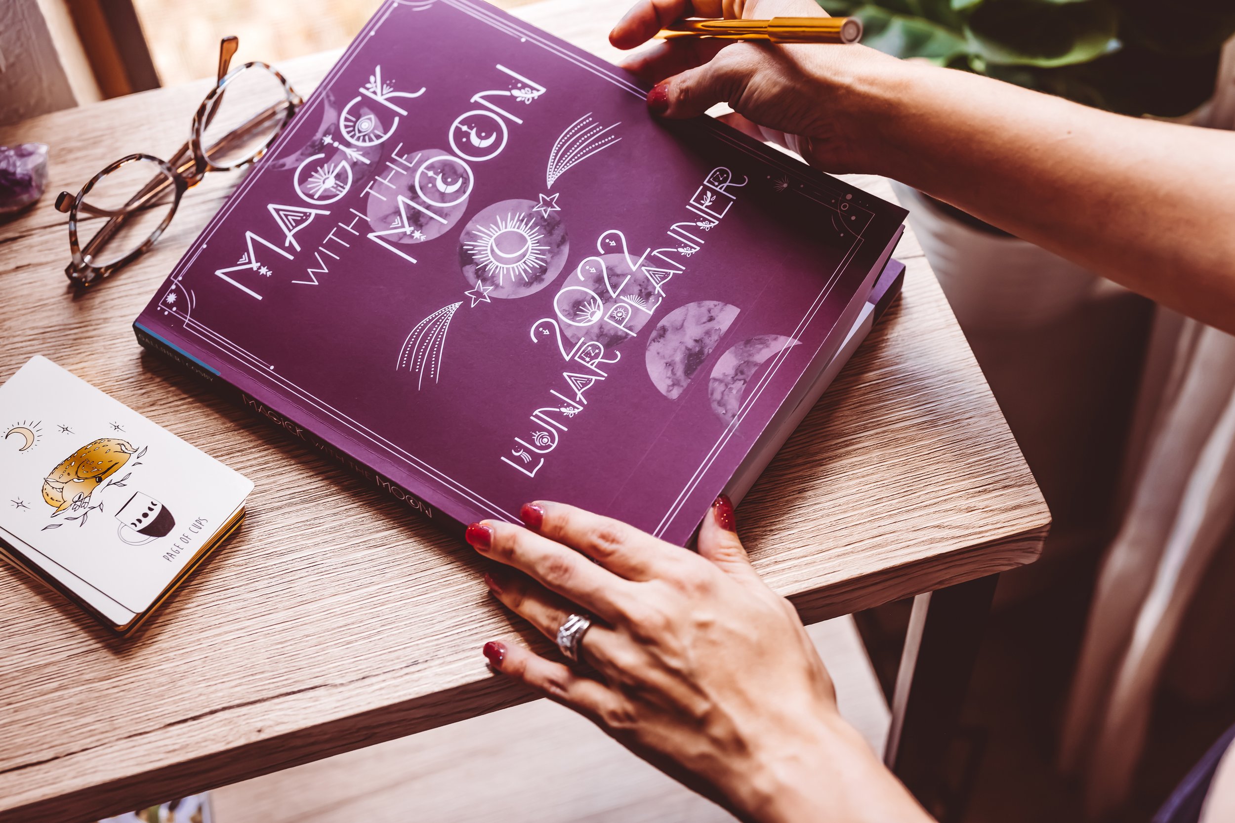 hand model opening tarot journal lifestyle photography