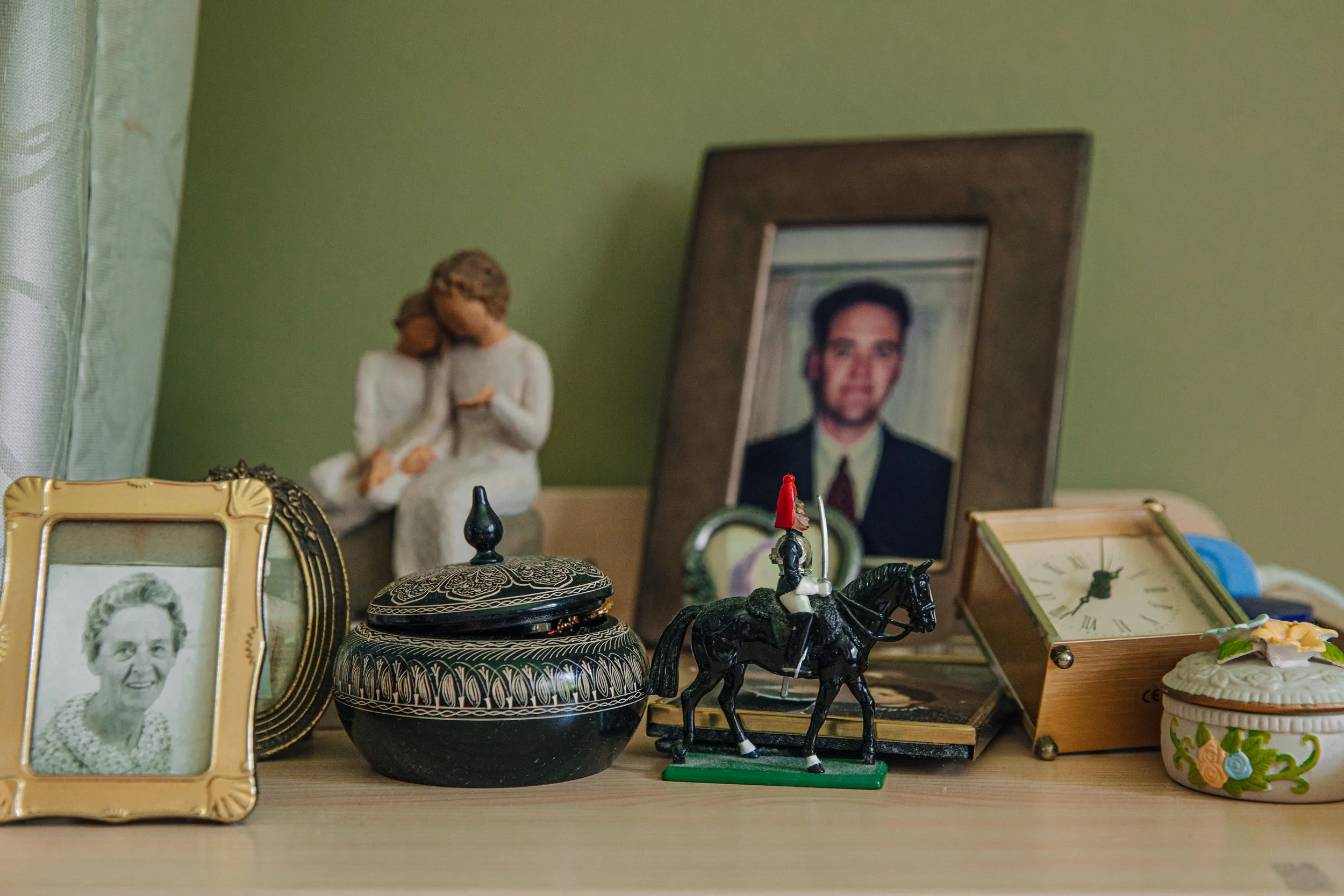 Olywn and Malcolm's bedside table at Summit Care Wallsend.