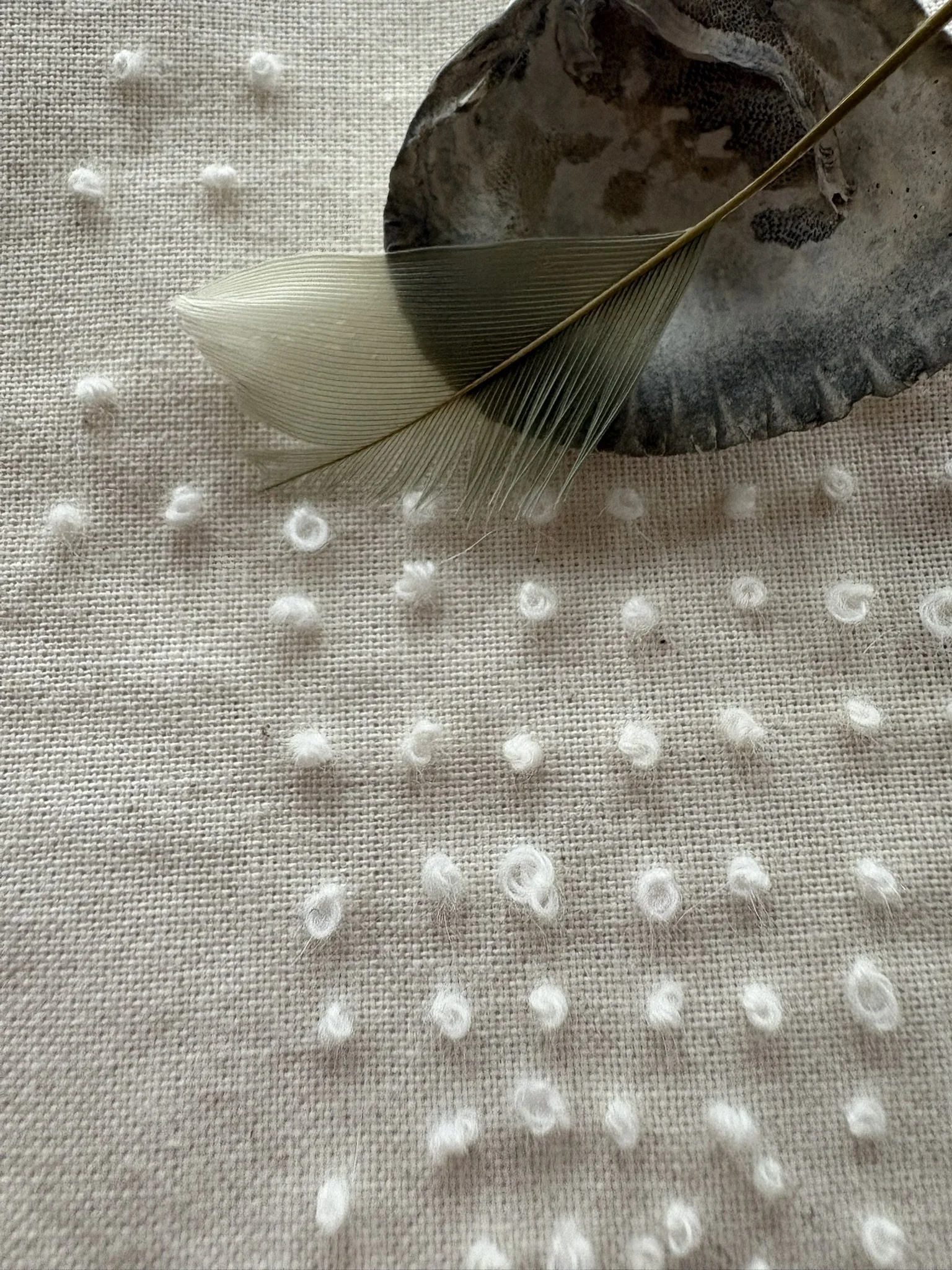 214 Knots and 1 Stitch_ Detail_Macken_2025_Calico_ CottonThread_Shell_Featherand Thread Shell and Feather.JPEG