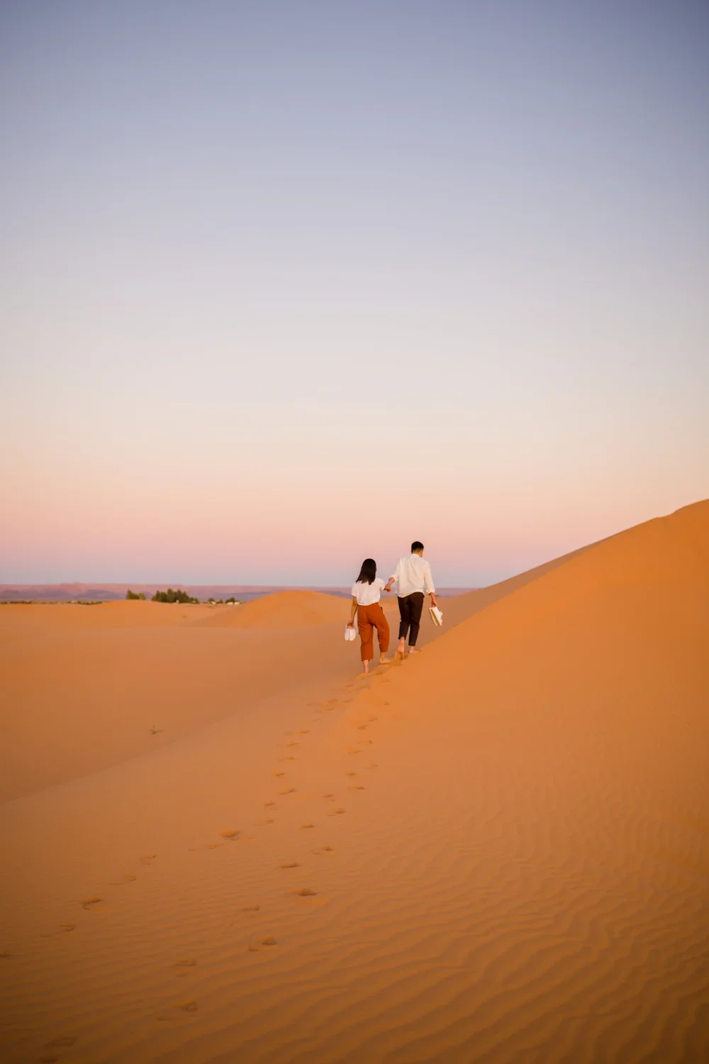 Engagement photoshoot in Merzouga desert , Morocco