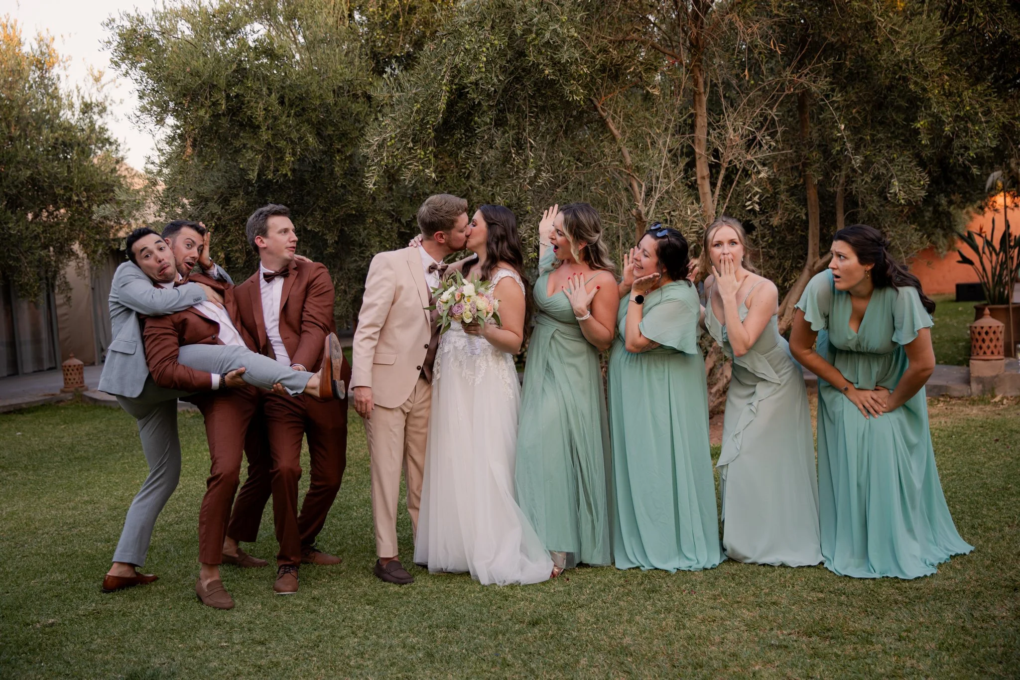 outdoor wedding reception under olive trees Morocco