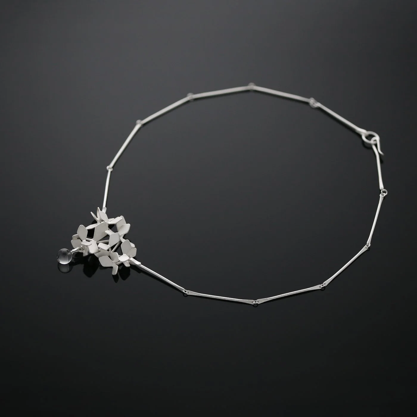 Sparkling Forest raindrop pendant - Finnish jewelry handcrafted in Lahti. recycled silver and rock crystal.