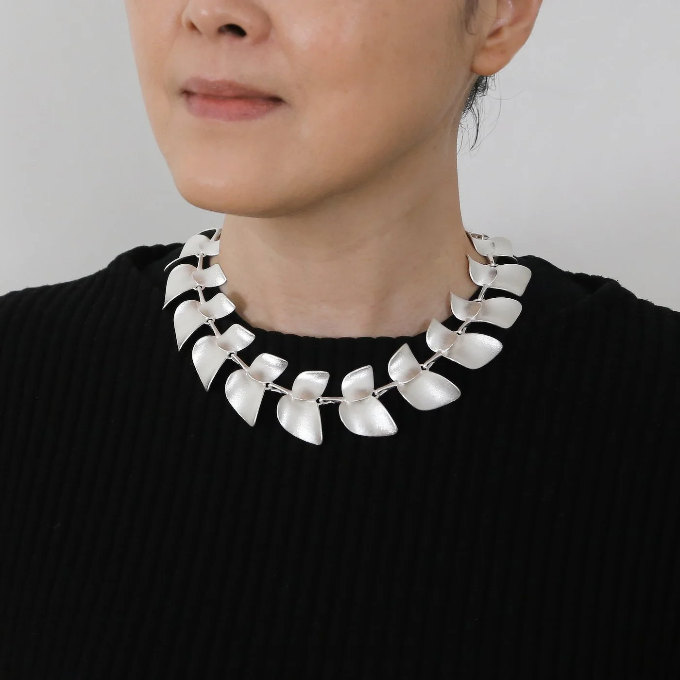 Nuppu necklace_2025_wearing_shop.jpg