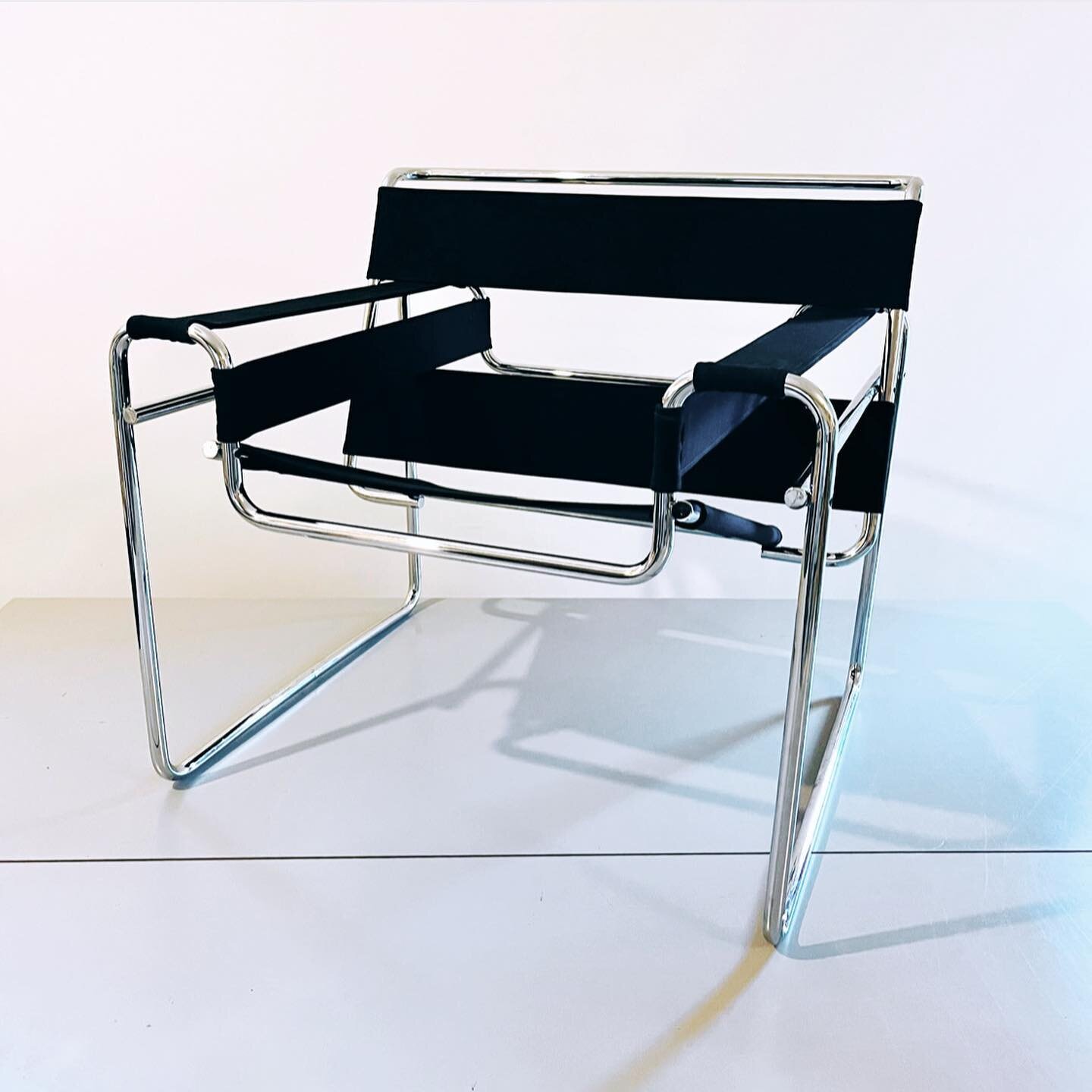 Modern. Minimal. Iconic. A revolutionary design. These genuine Wassily Chairs were designed by Marcel Breuer in 1925 and came straight out of the Bauhaus, an influential school of modern art, architecture, and design in Germany. Inspired by the light