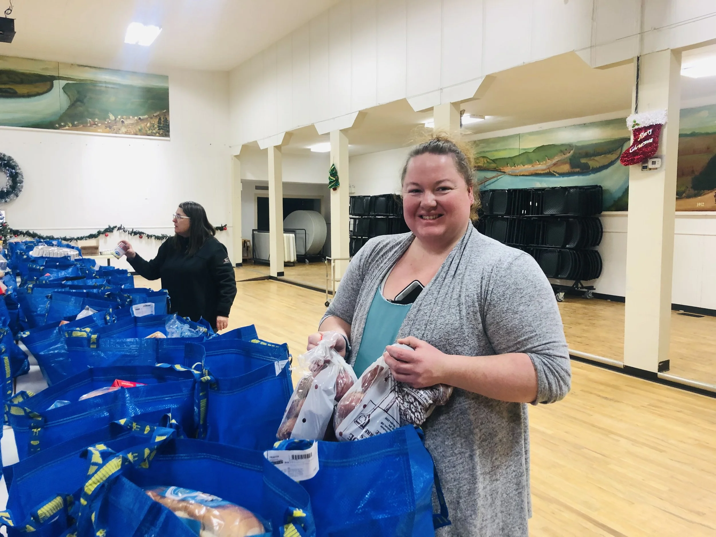 Volunteering filling Christmas food hampers