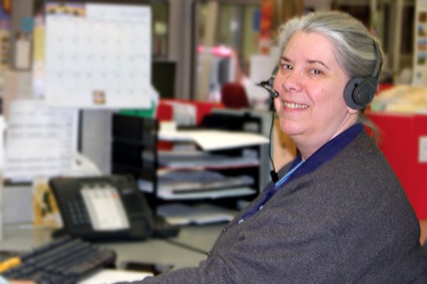Answering the phones in our Bremerton, Washington call center.