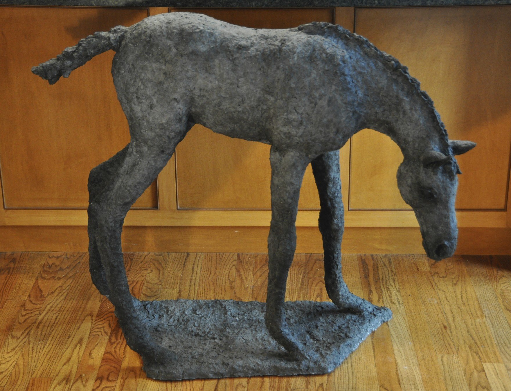Curiosity. Life-size Paper Mache. 44x38x17"