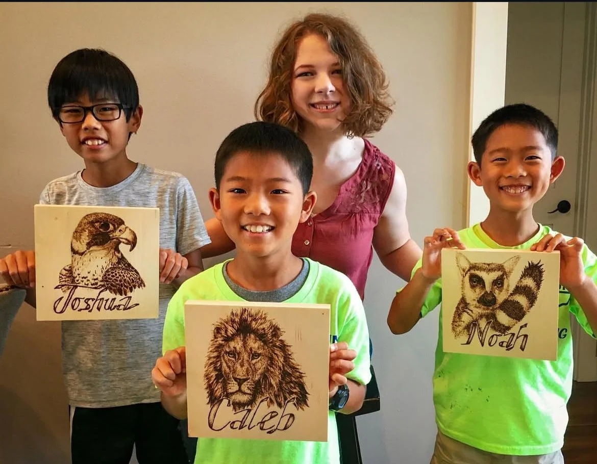 My students Joshua, Caleb, and Noah with their gifts I made for them as a thank you for their surprise contribution to my Razor-Tip Woodburner.