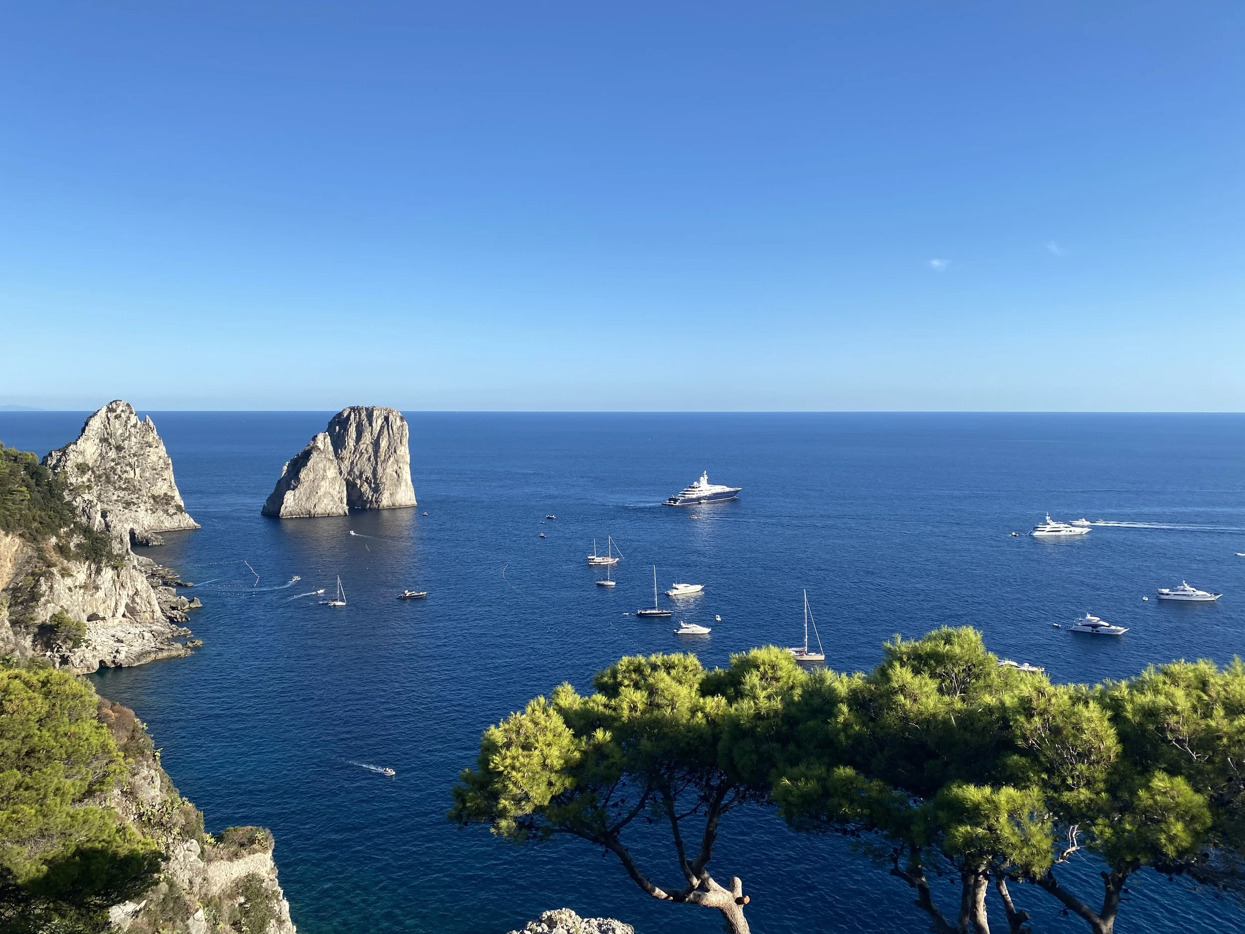 Views of Capri's dramatic Faraglioni rocks from the terrace of Hotel Luna
