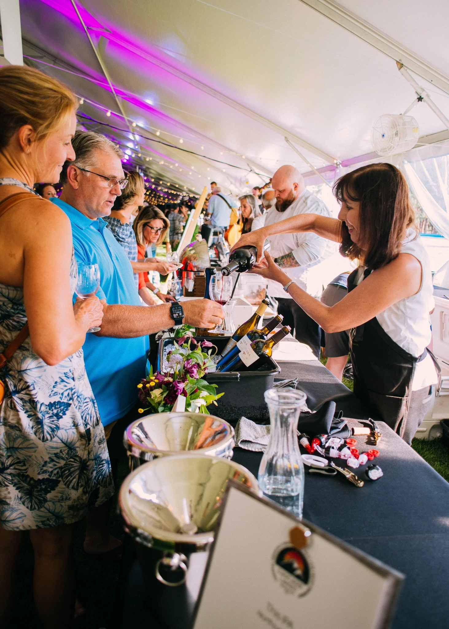 Pour wine at Sip on Cork and Barrel weekend