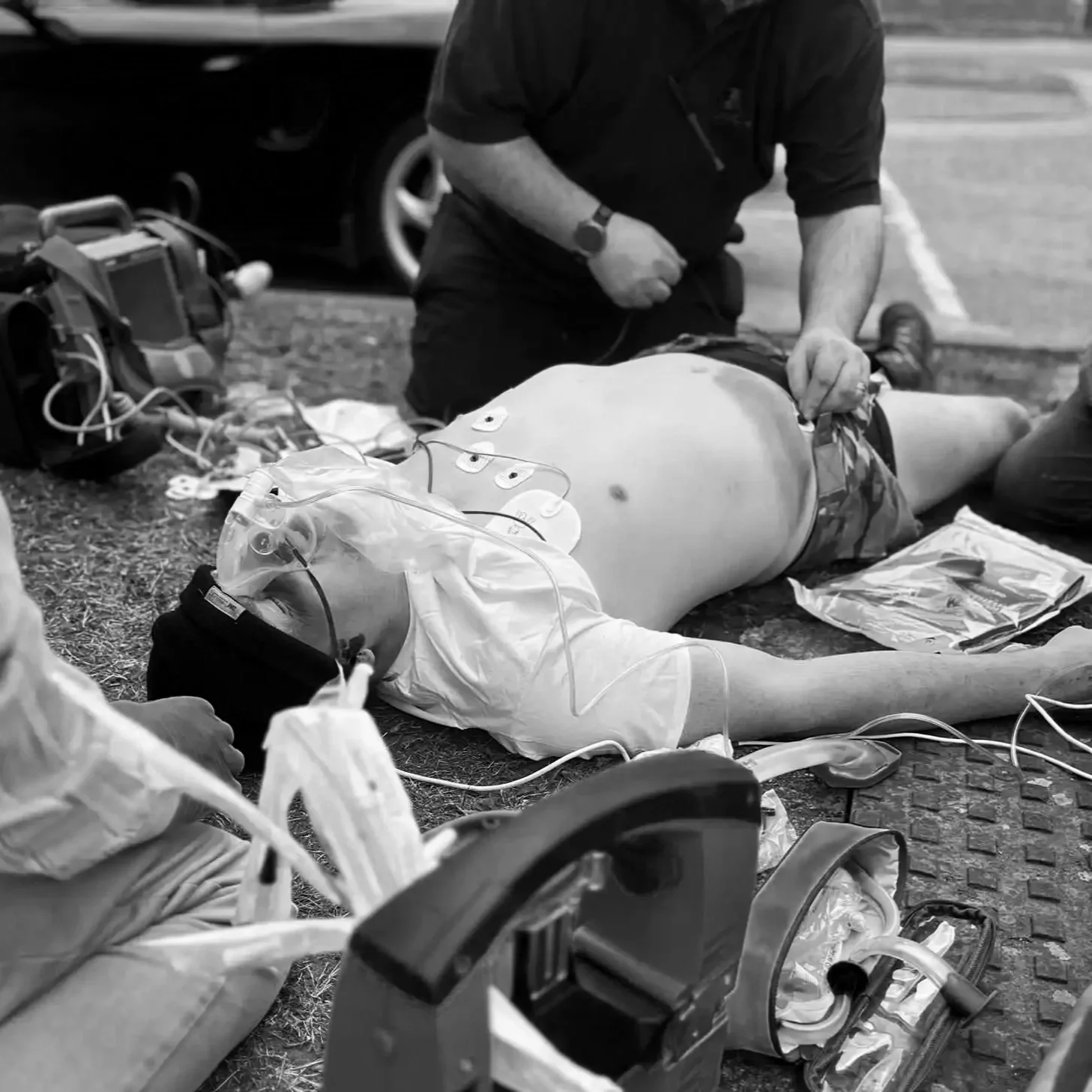 Advanced responder performing structured patient assessment during FREC Level 4 training