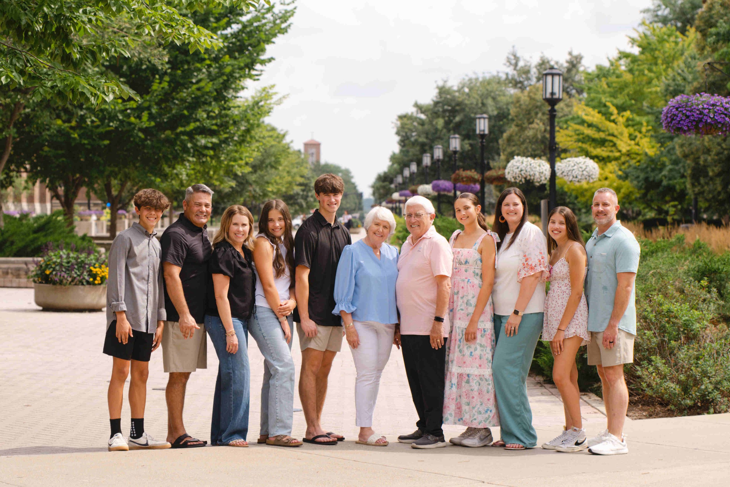 3 generations of family standing together at Purdue University in West Lafayette for their extended family pictures by Heather Corbin Photography