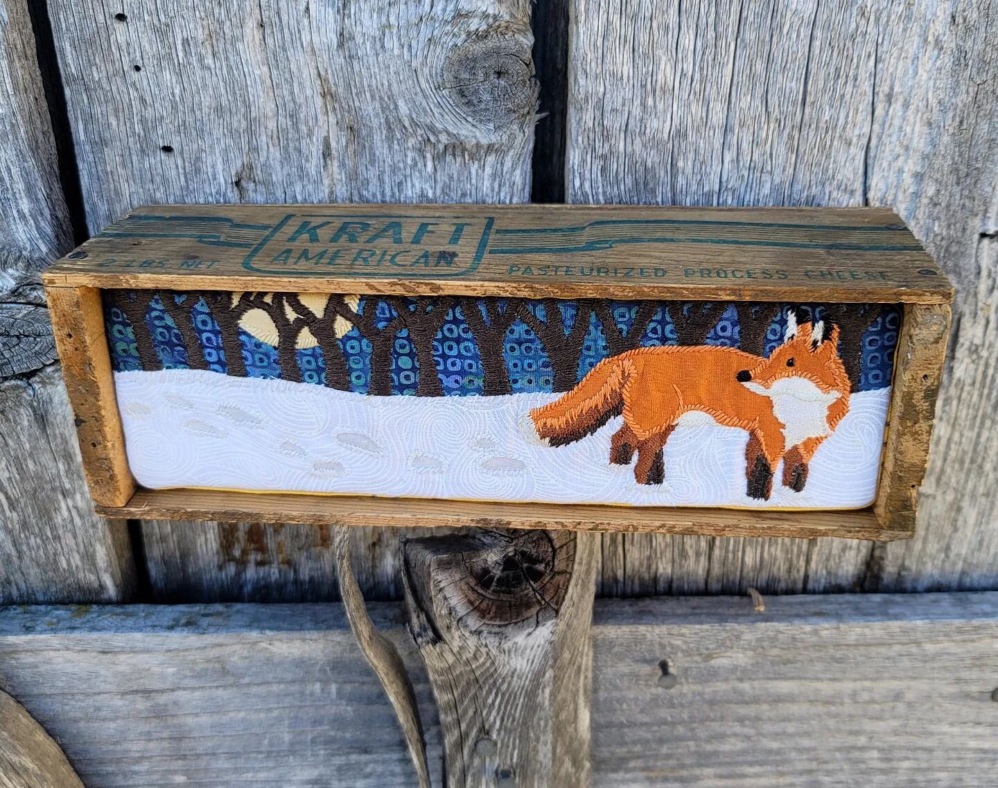 It's a fox, in a box, a wooden cheese box. Yup, processed cheese use to come in wooden boxes and there was more brands than Velveeta. This feels very wintery to me. Colorado finally got some snow and now all I want to stitch is birds and spring bloss