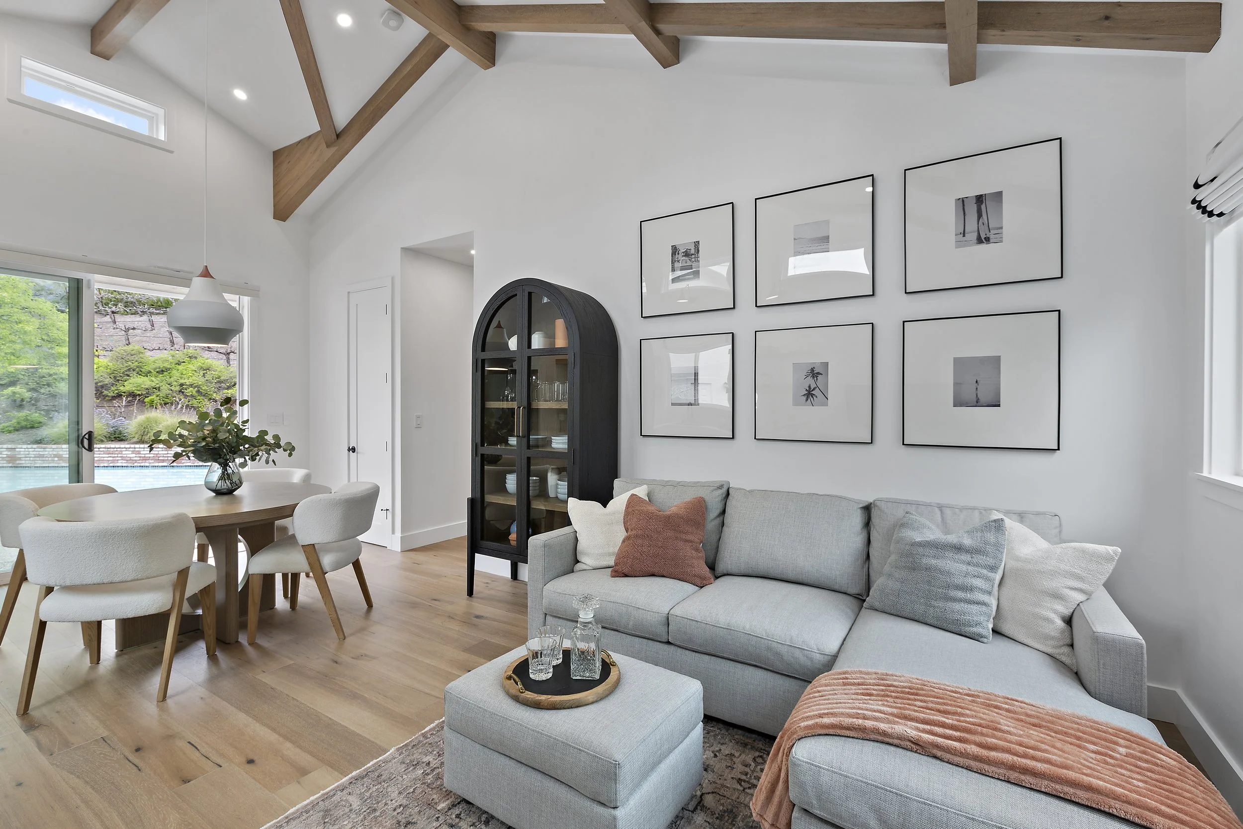 Modern living room designed with a warm, inviting aesthetic featuring layered textures, comfortable furnishings, and thoughtfully curated details for everyday living.