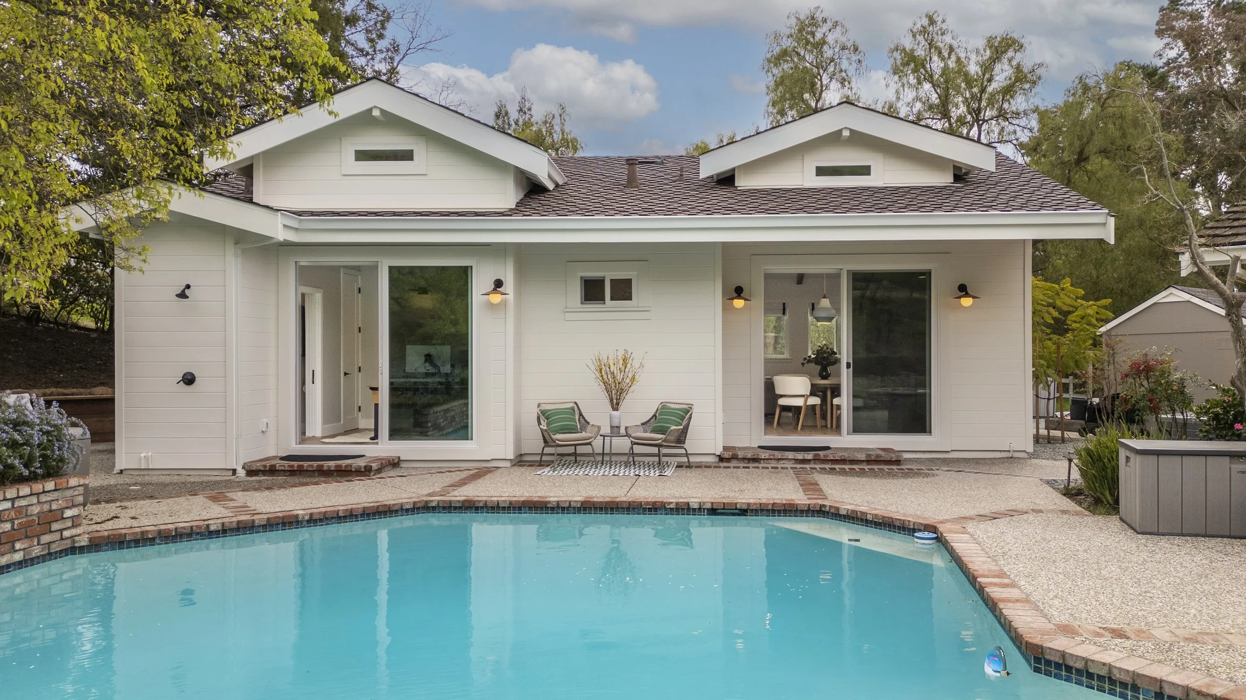 Modern Bay Area ADU exterior featuring clean architectural lines, warm natural materials, and thoughtfully designed outdoor living spaces for seamless indoor-outdoor living.