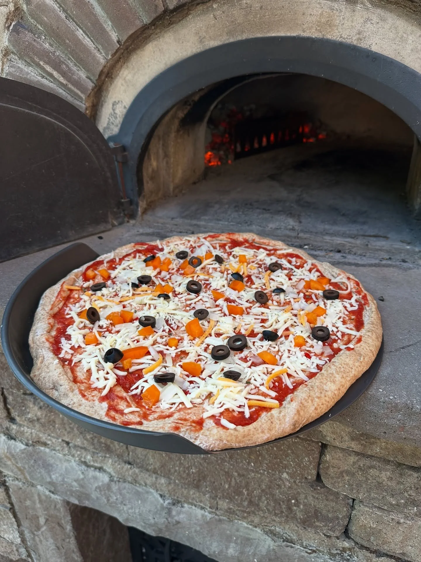 Tested the @lloydpans bar pie shovel in the brick oven today. Worked pretty well. Looking for a good way to make several pies ahead of time for bigger groups. Thinking a few of these might help with that. 14&rdquo; pan used here. 

#lloydpans #bricko