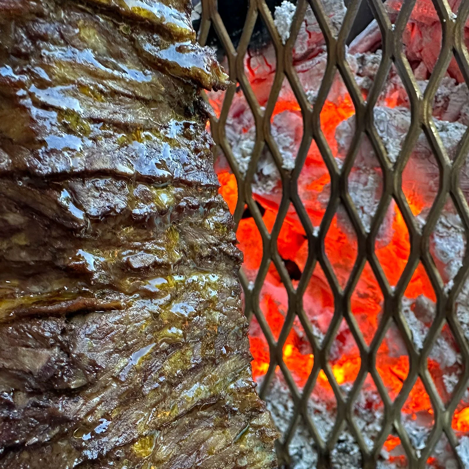 Beef Shawarma on vertical charcoal grill, Northern Barbecue Method by Chef Mike Belobradic.