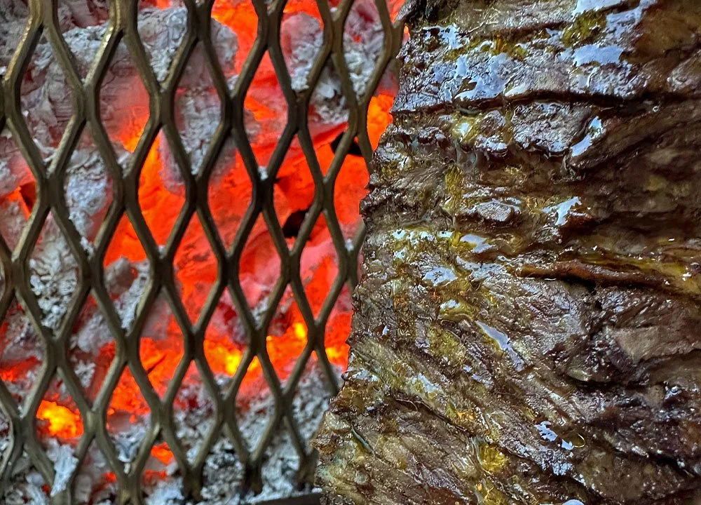Charcoal shawarma cooker.