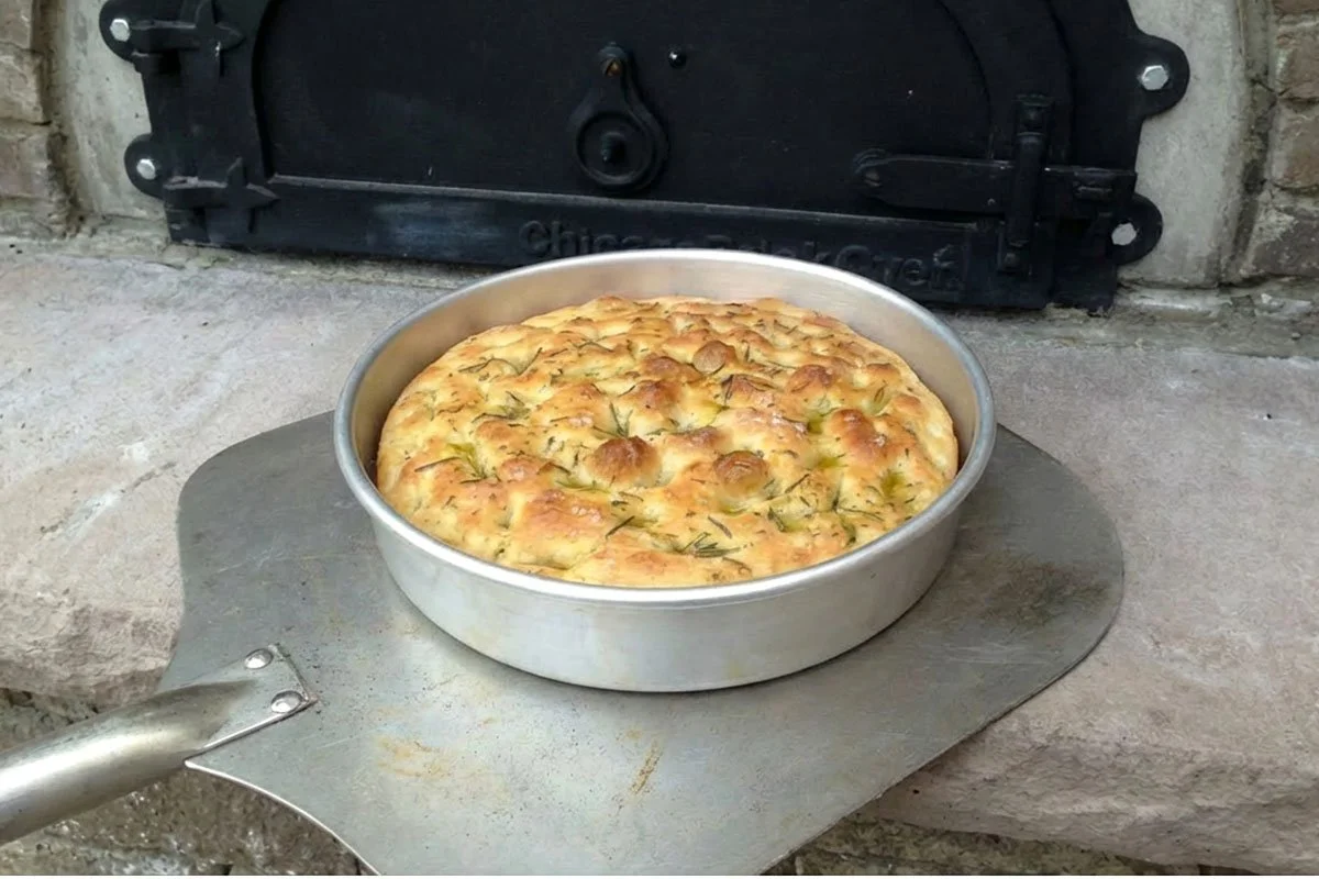 Baked focaccia bread from the wood-fired brick oven.