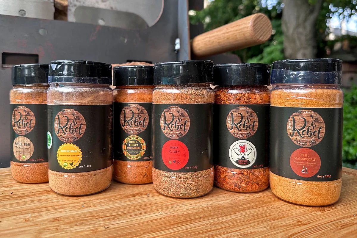 Rebel Bad Ass BBQ spice rubs on a Black Earth Grills Gaucho.