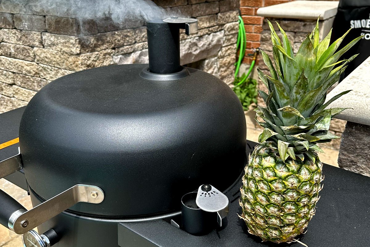 Bronco smoker with a pineapple.