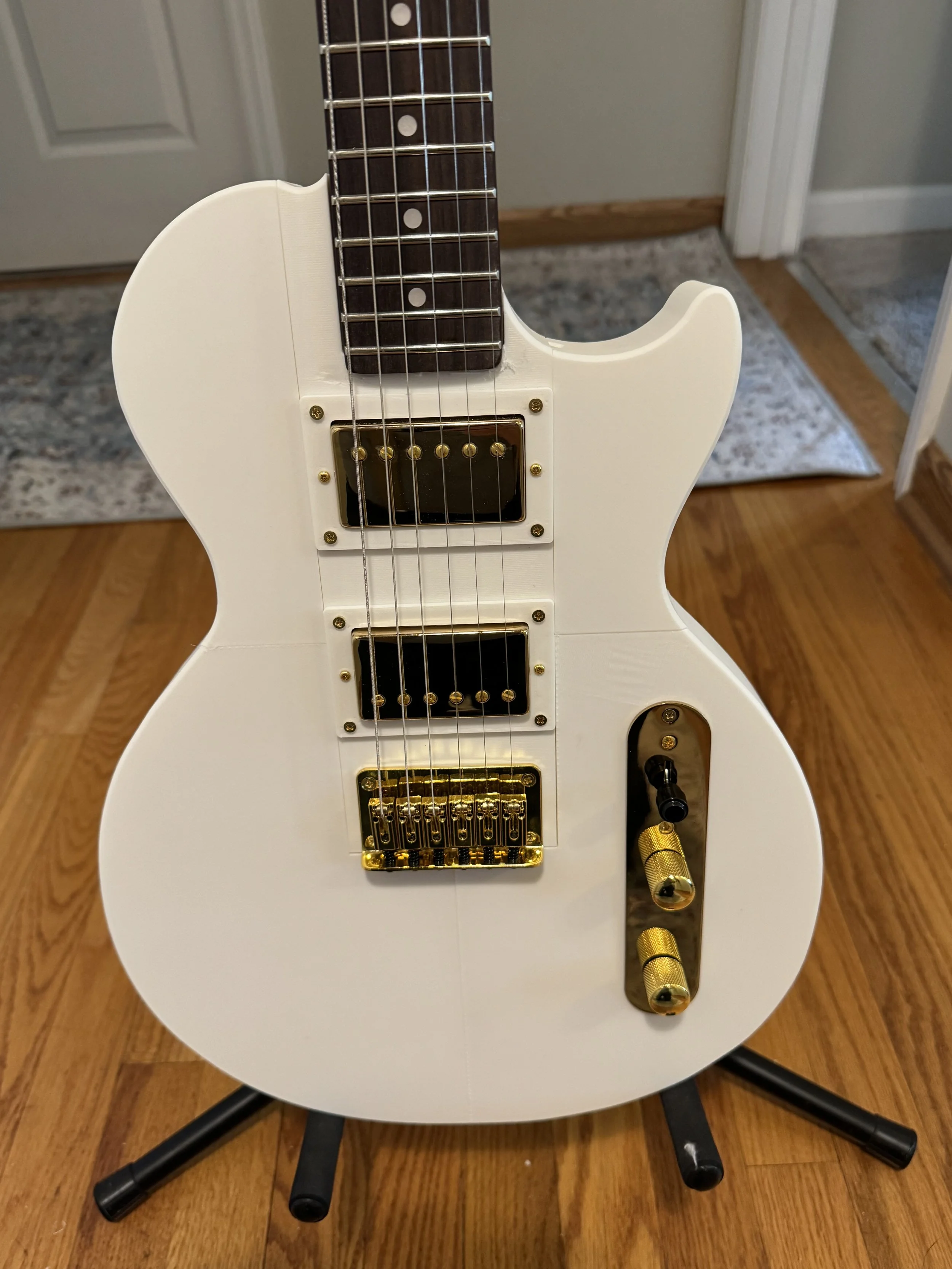 "I'm glad I went with the 3D Print Zone concept after looking at quite a few other designs. It went together smoothly,
support was there when I made one dumb assembly mistake, and it sounds and plays wonderfully. With the modular design the next bu