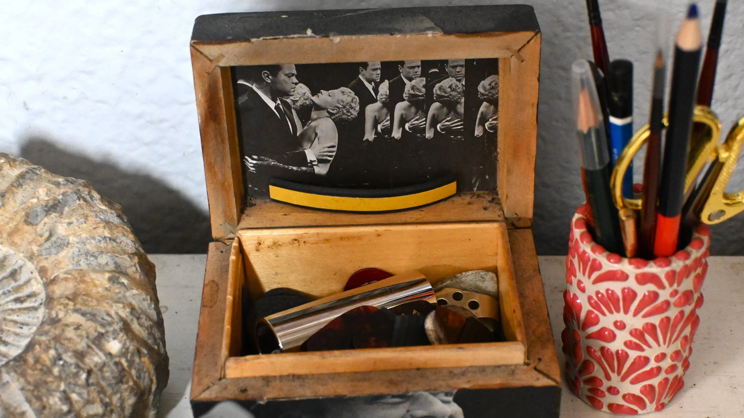 Albion's box of guitar picks in their studio