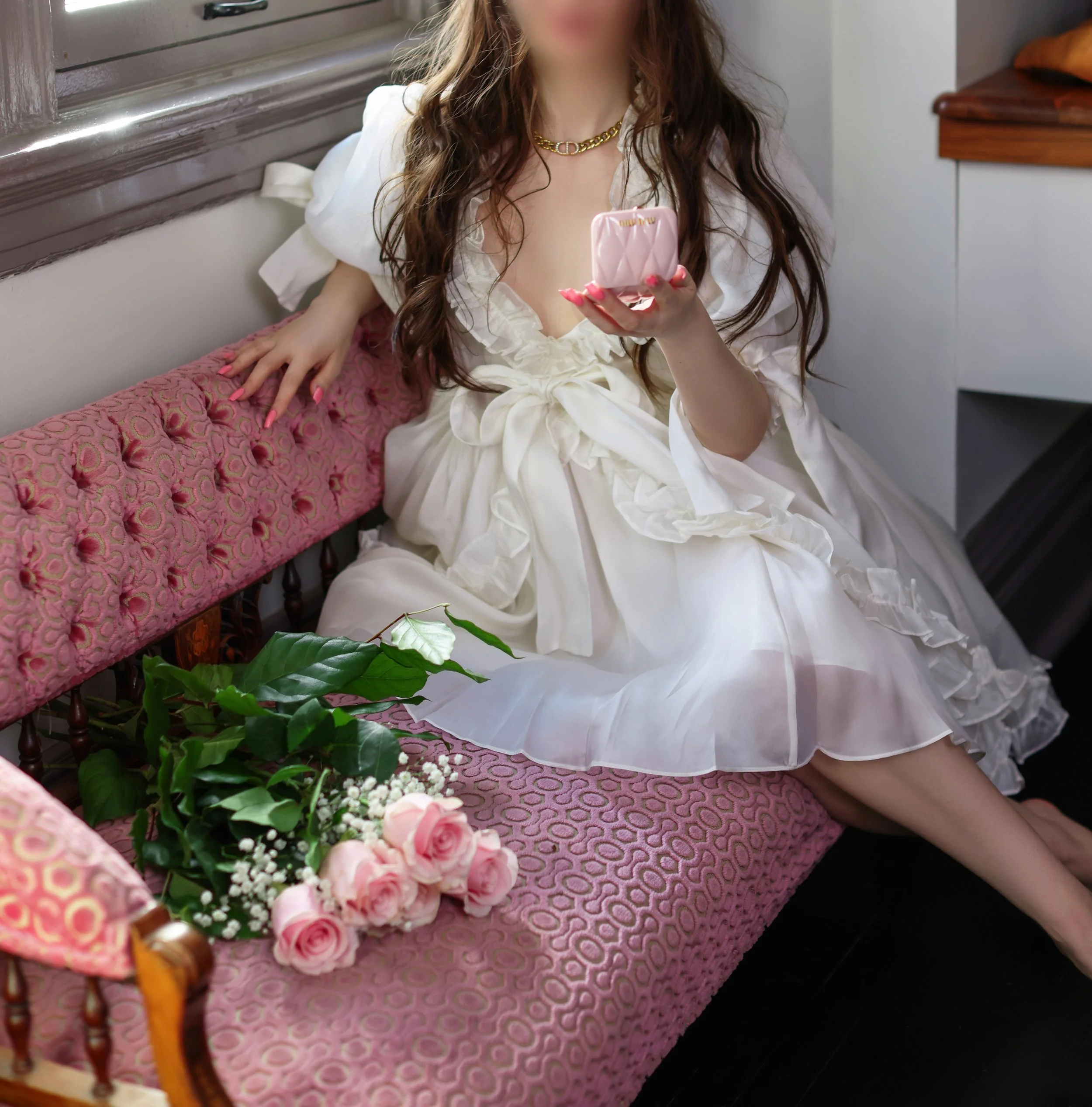 luxury companion in a white dress