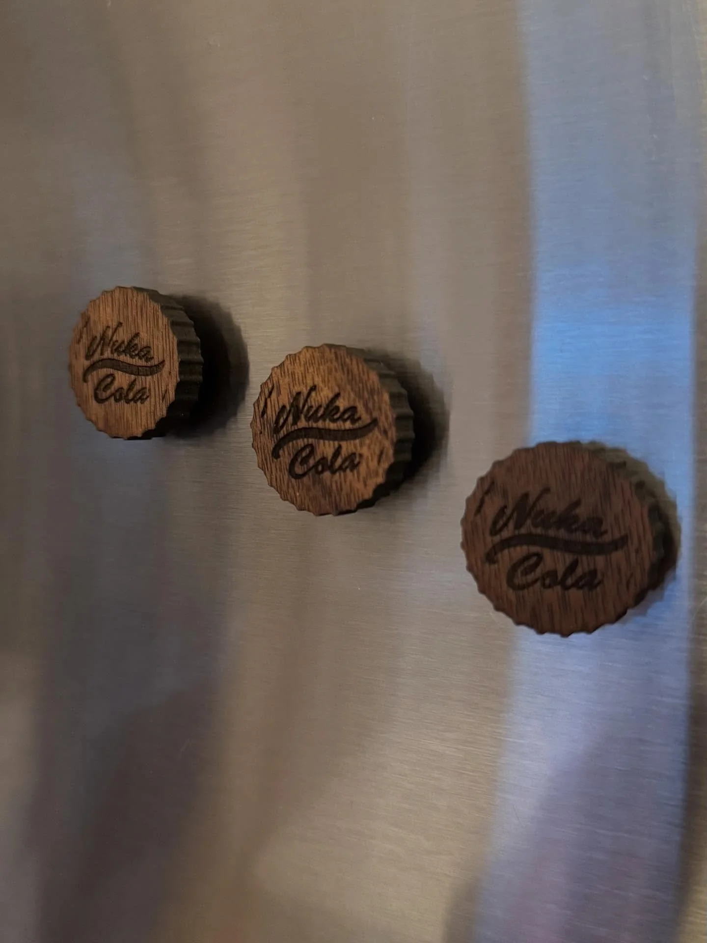 To celebrate Fallout Day, I&rsquo;m including a free Nuka-Cola wood magnet in all orders placed since 10/23.
Carved from walnut in the wasteland of my basement workshop.
These won&rsquo;t be sold &ndash; just gifted to the true survivors who place or