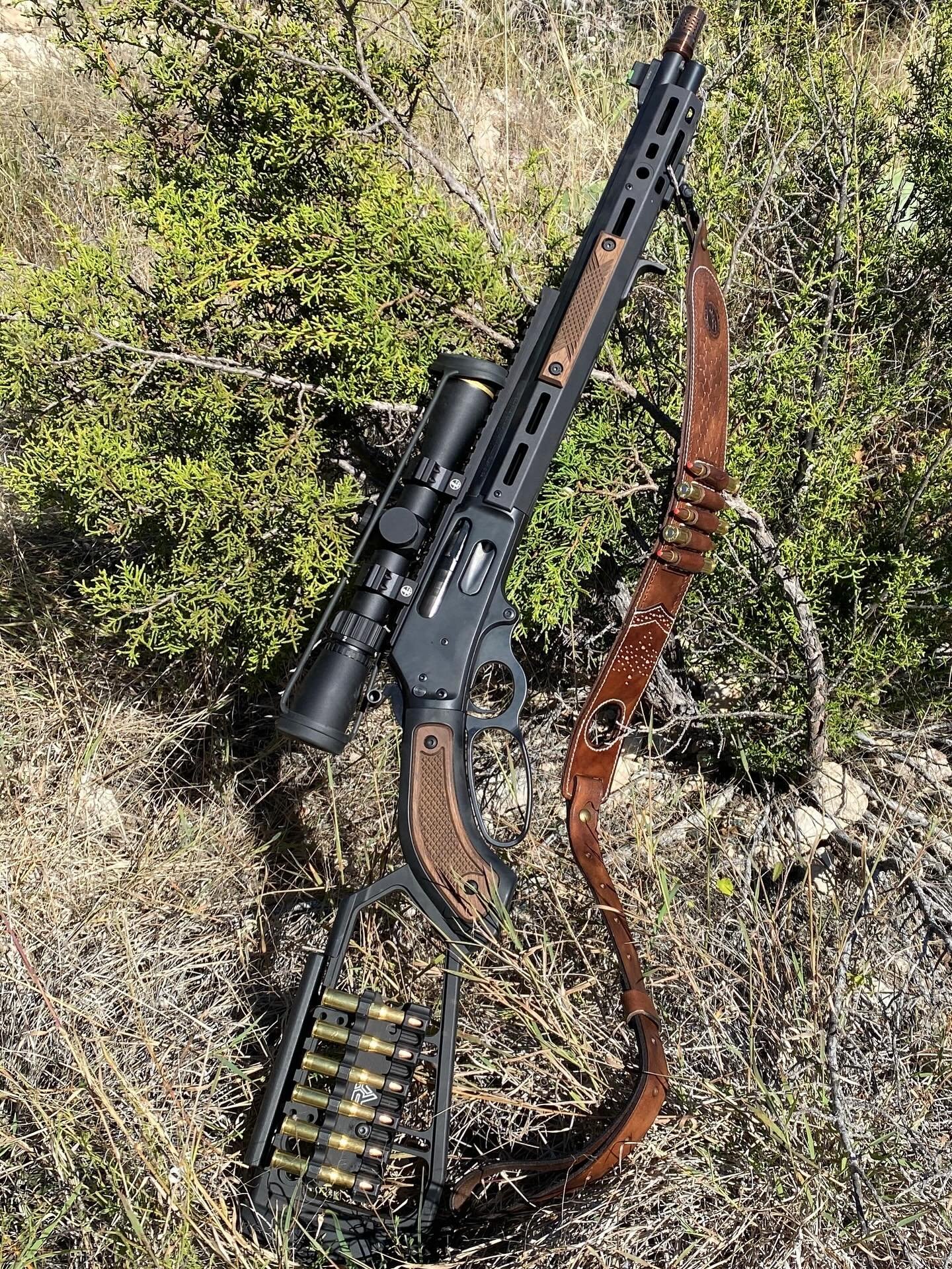 Customer photo came in too good not to share&mdash;this rig is all business. Lever gun, clean glass, leather sling loaded up, and those deep-checkered walnut inserts + matching rail covers tying it all together. Just purpose-built gear out where it b