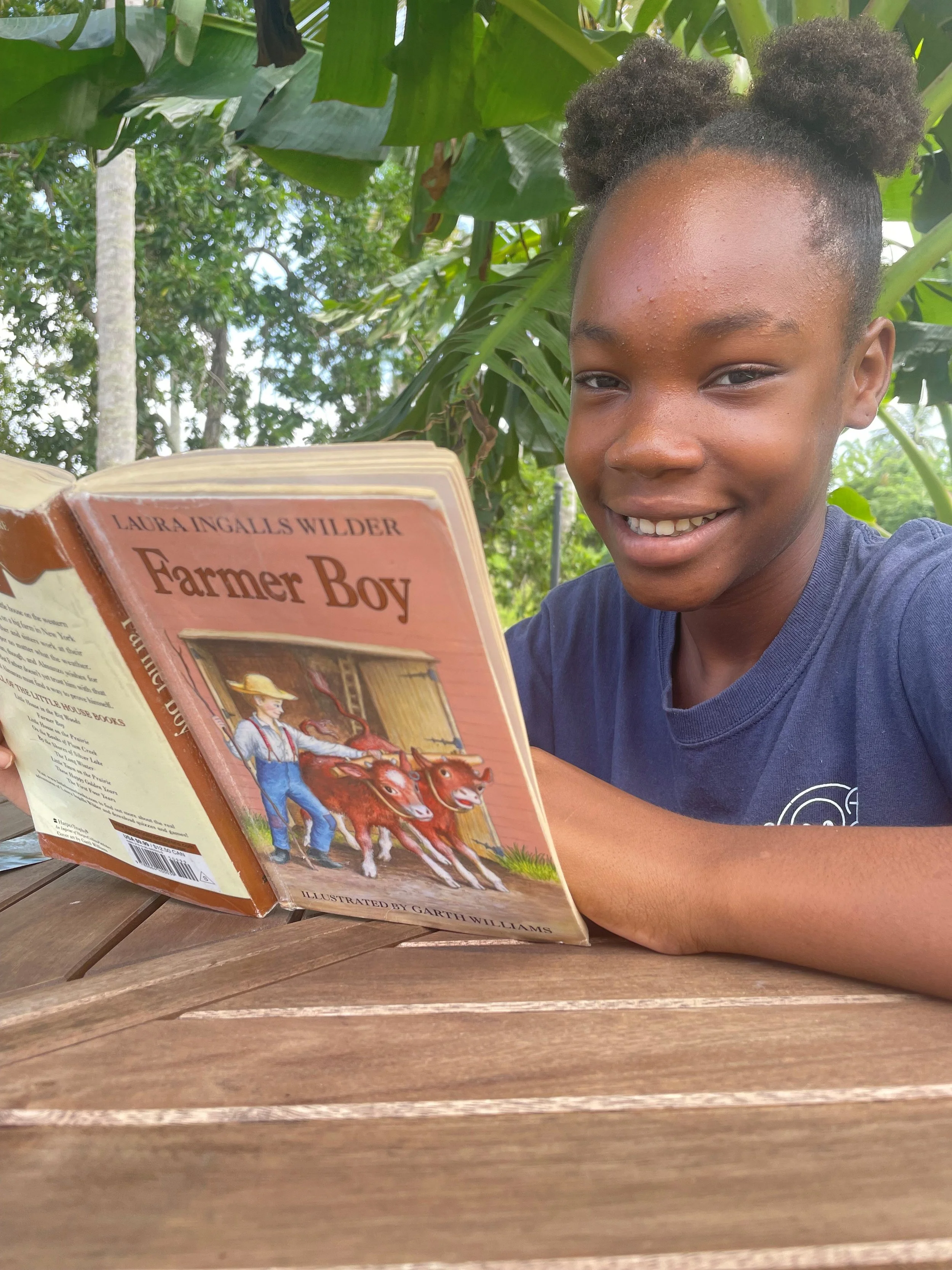 Dominican student reading in English