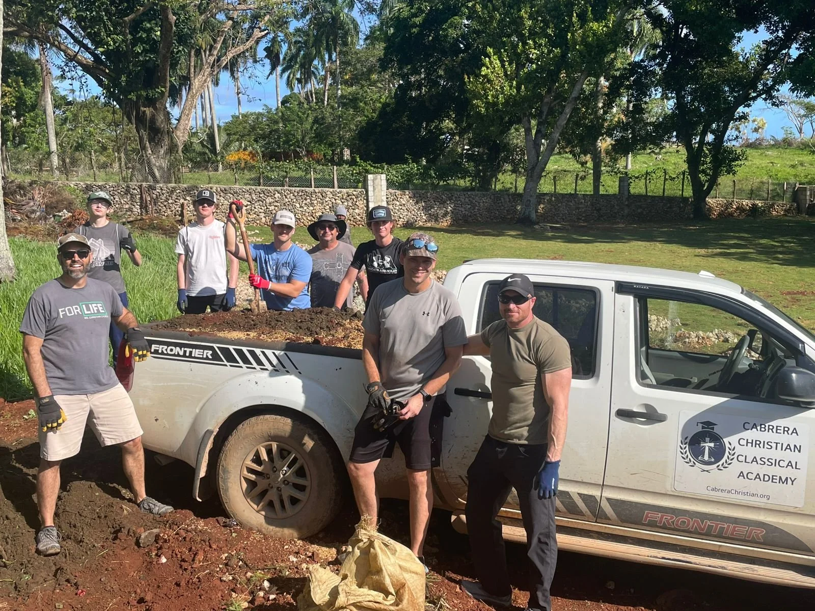 Volunteer Missionaries with Truck