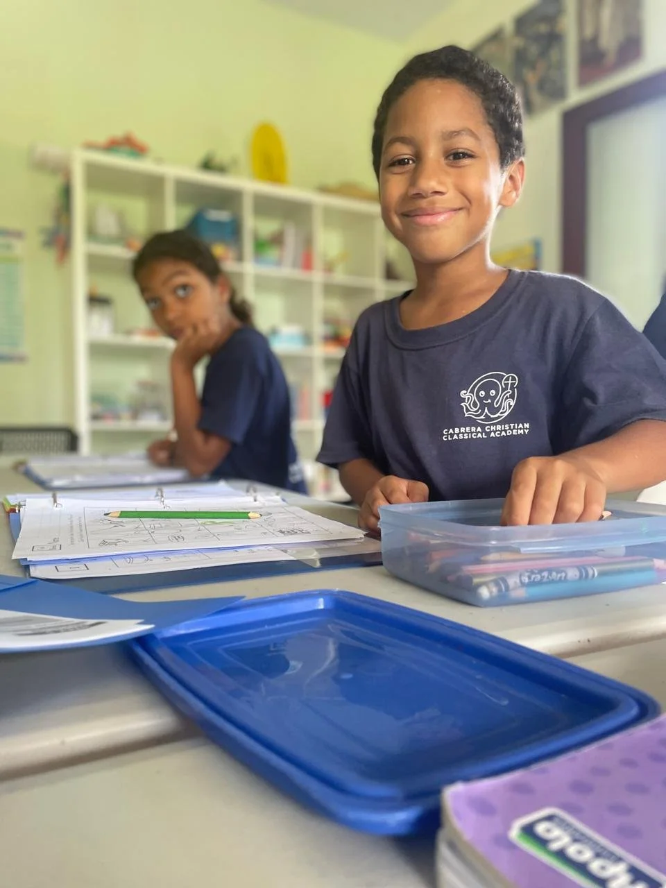 Portrait of Dominican student in classroom